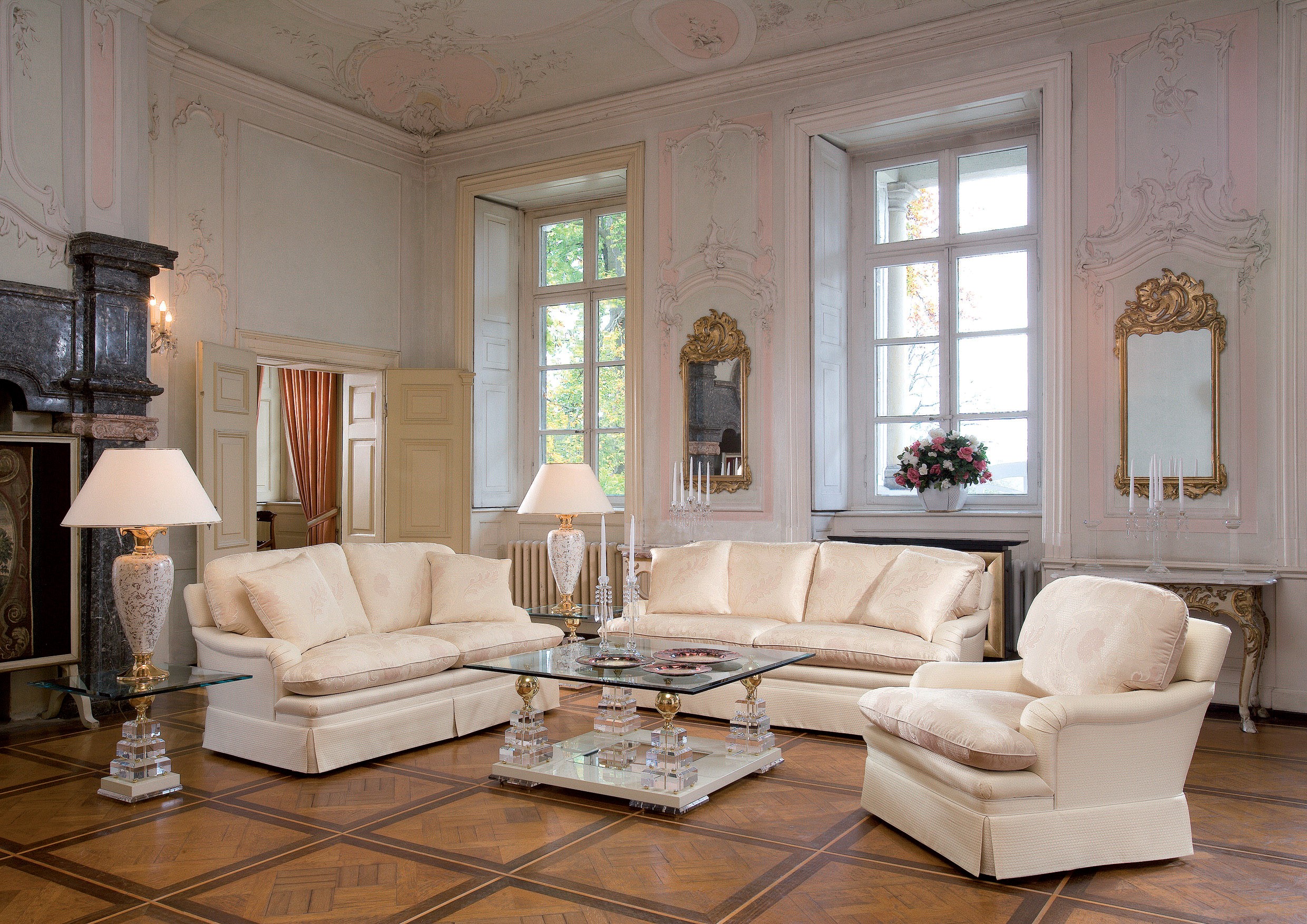 Elegant living room with sofas, table, and lamps HD Wallpaper