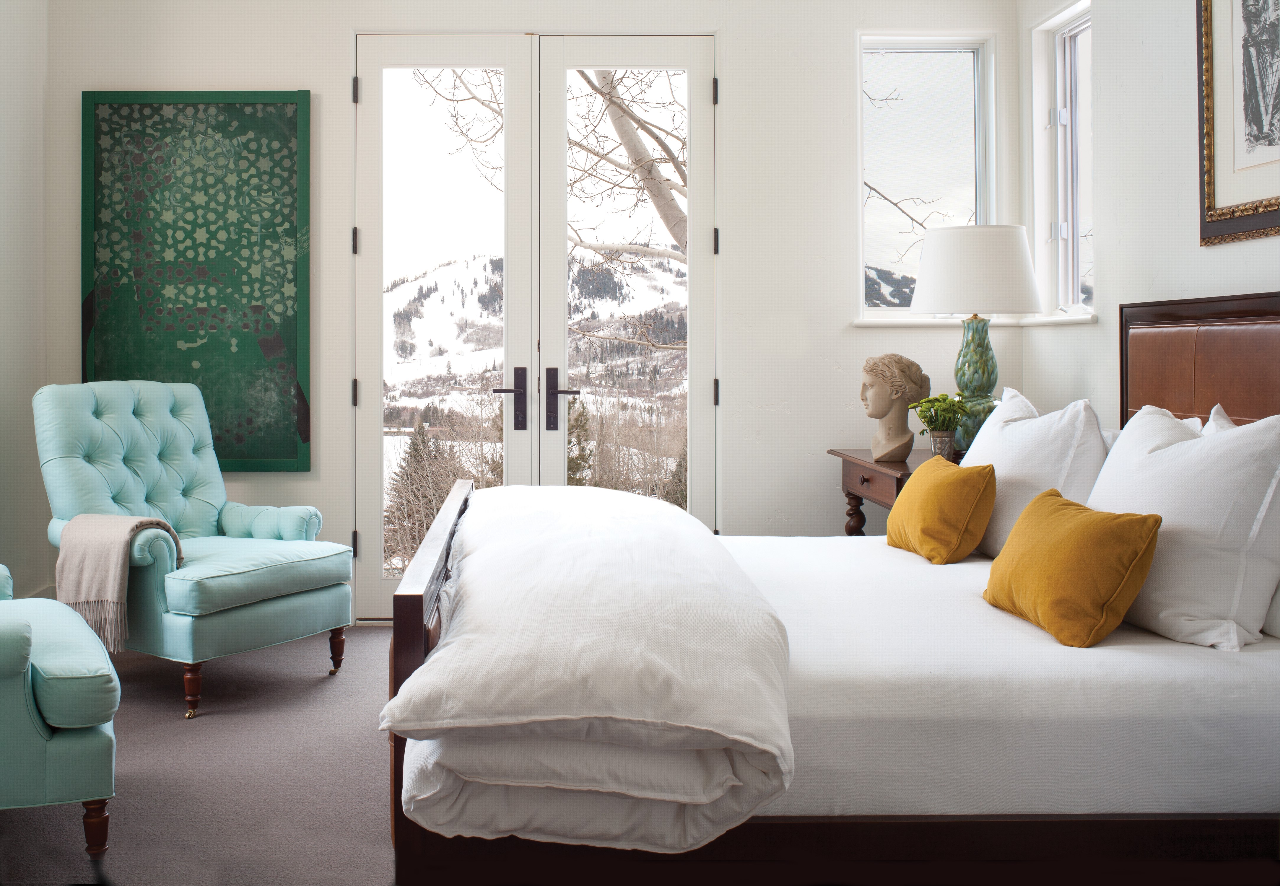 Bedroom with a view of snowy mountains HD Wallpaper