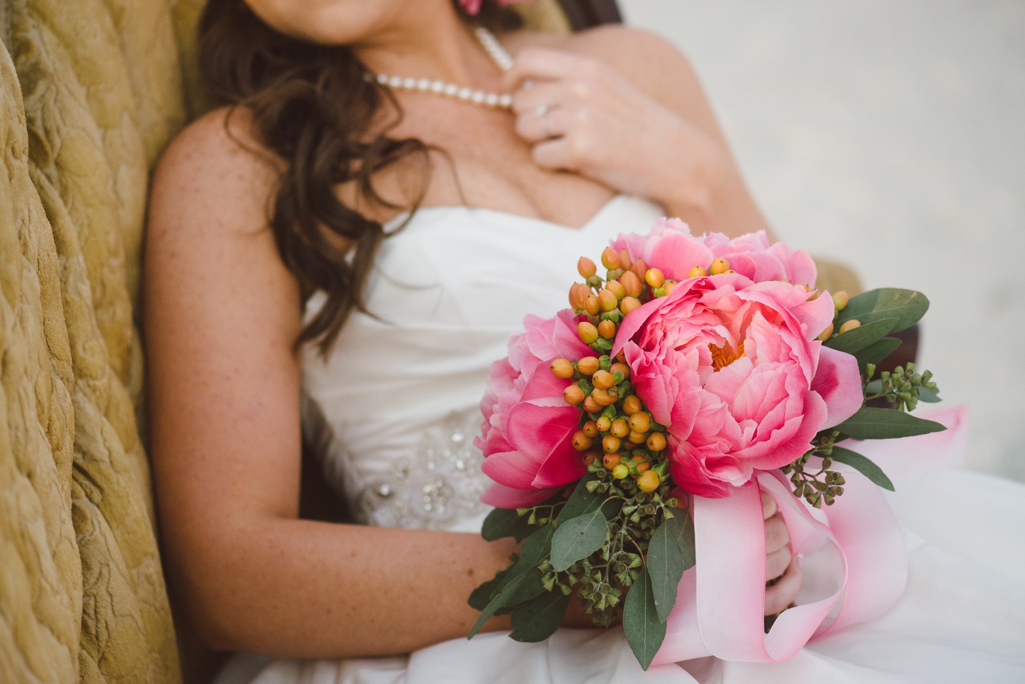 Bride holding a pink peony bouquet HD Wallpaper