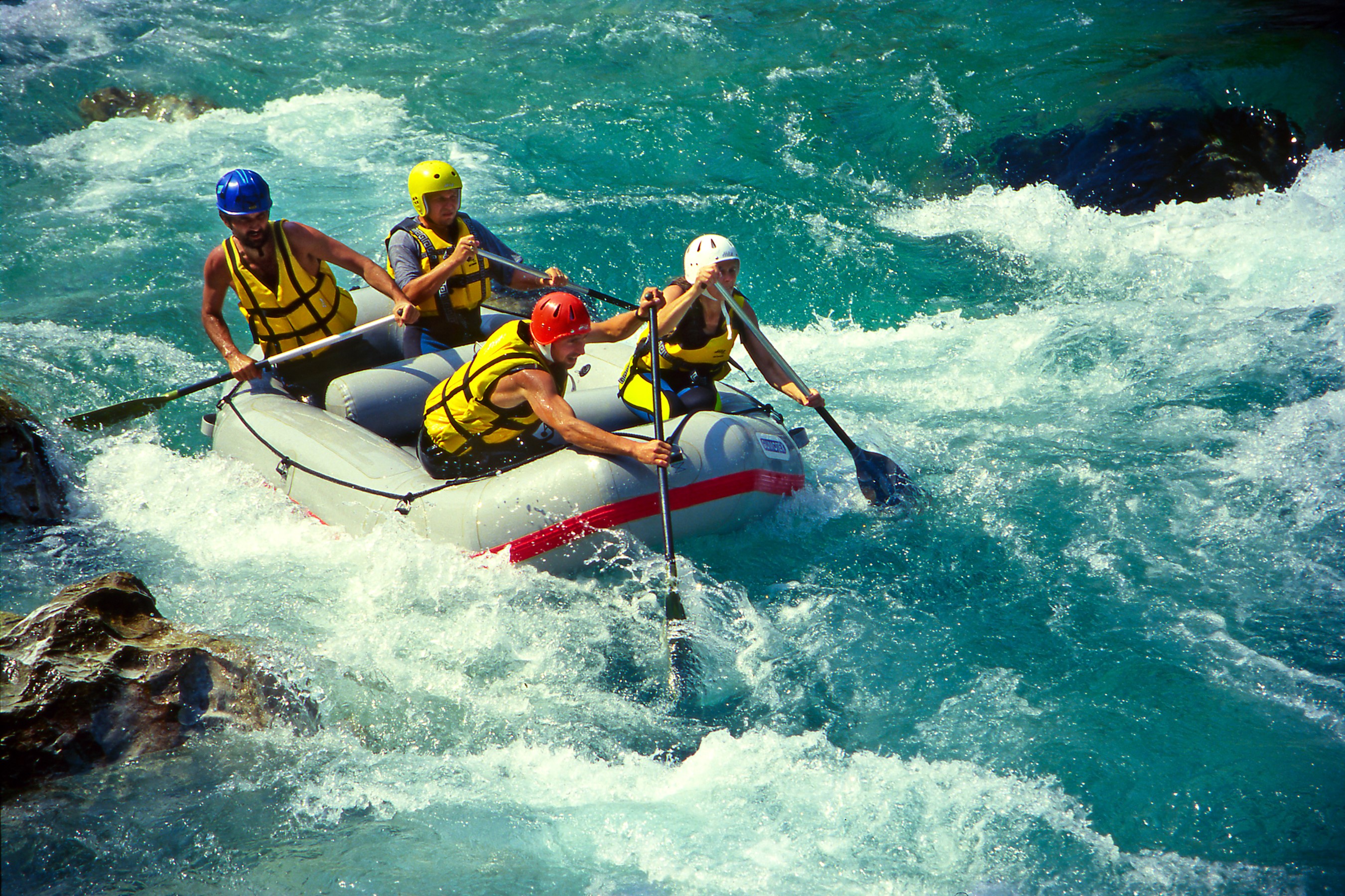 People white water rafting in a river HD Wallpaper