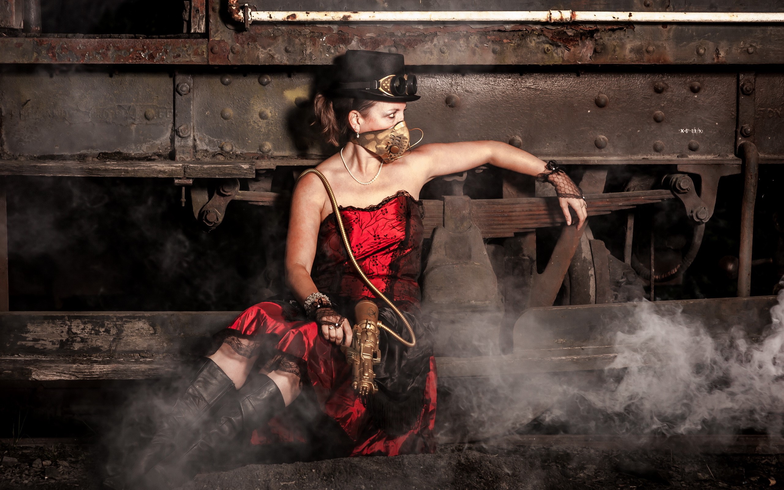 Steampunk woman with mask and gun on train HD Wallpaper