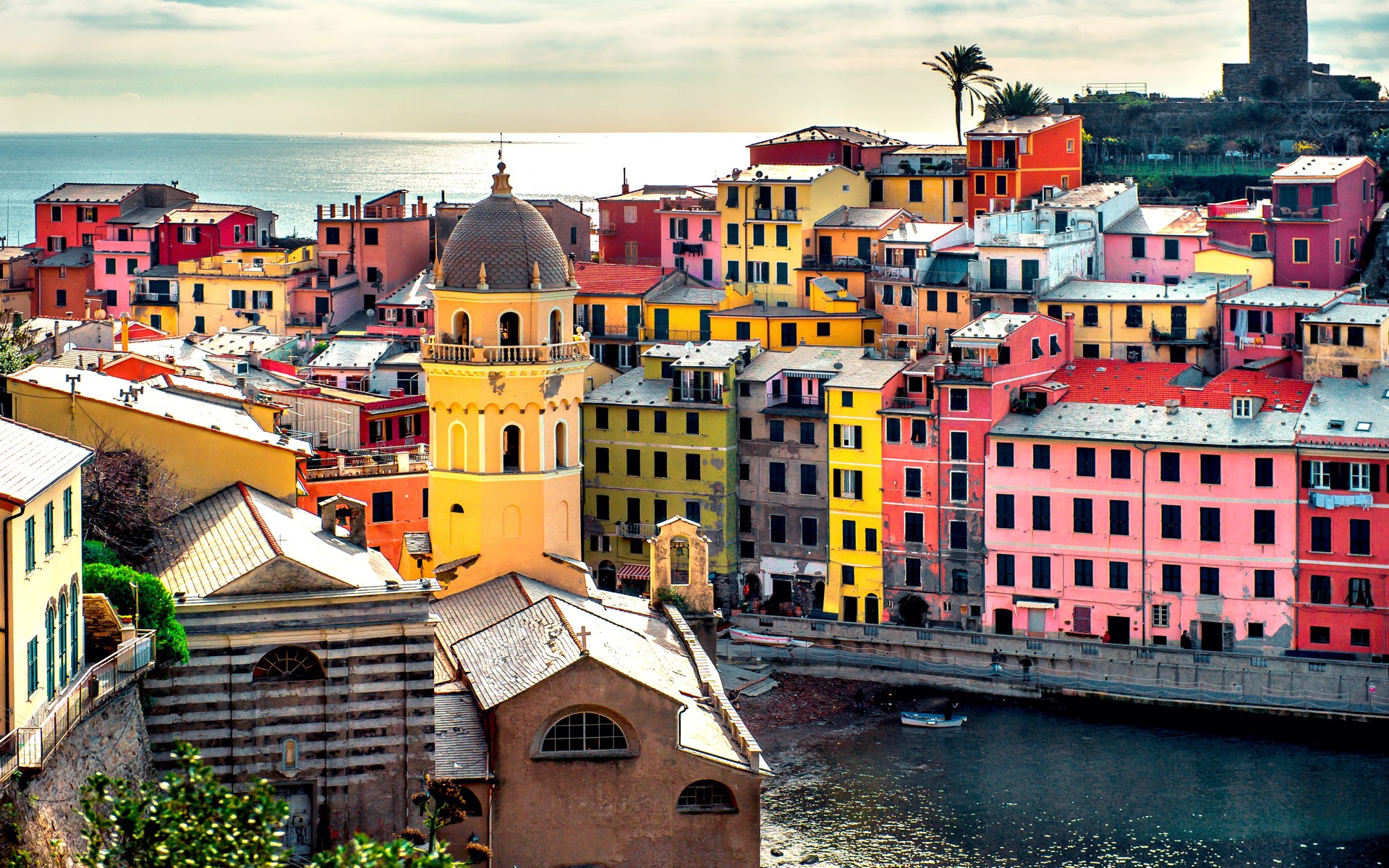 Colorful Italian coastal village with a church tower and the sea HD Wallpaper