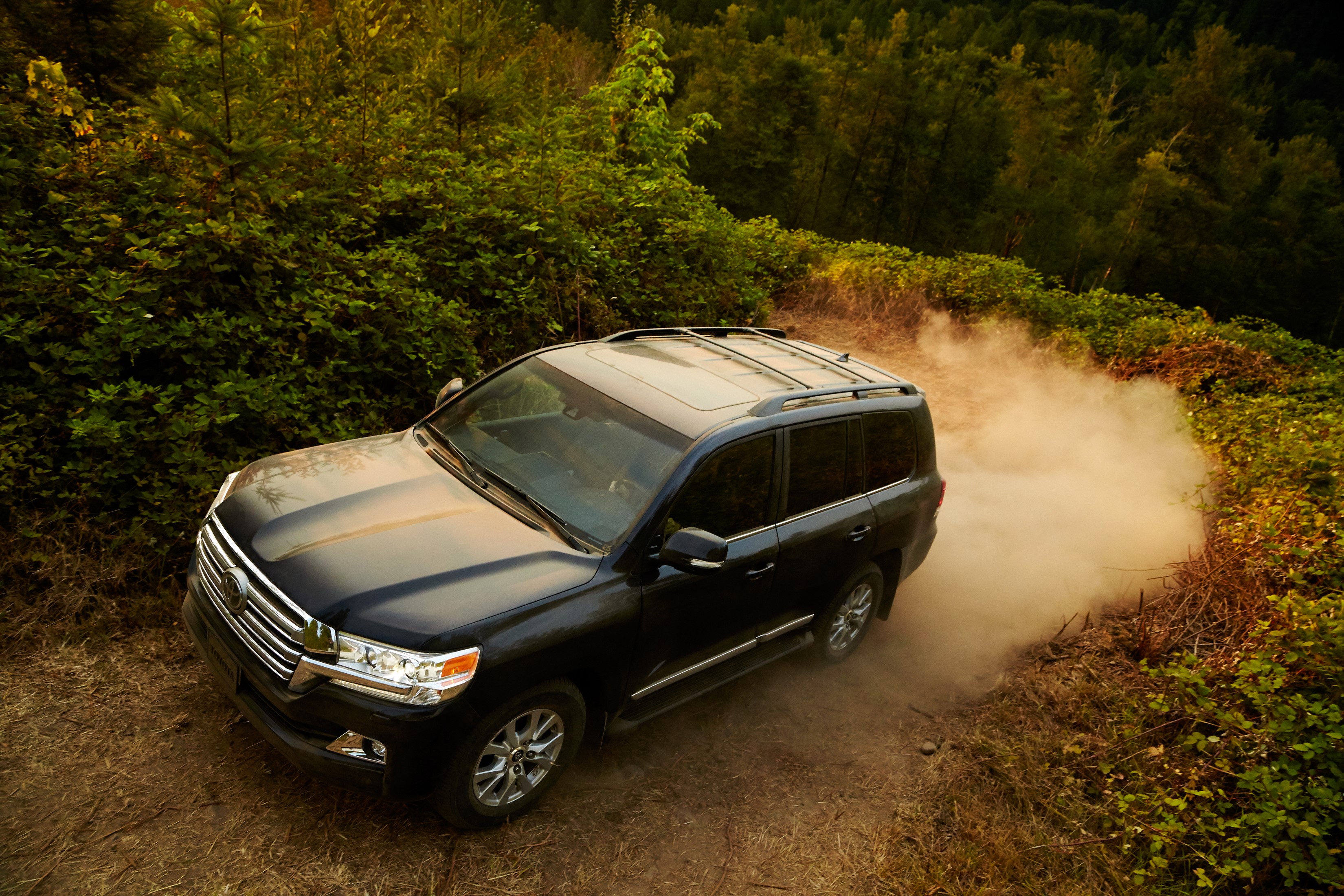 Black 2016 Toyota Land Cruiser driving off-road HD Wallpaper
