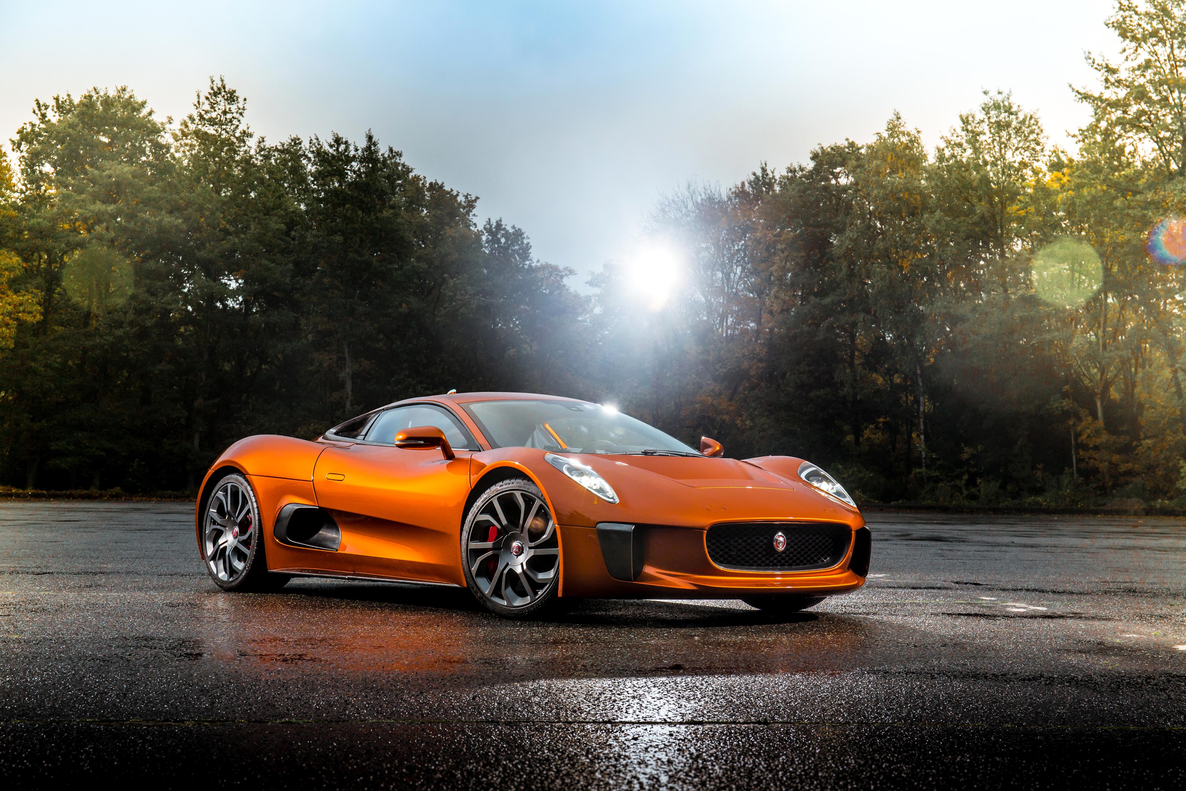 4K Orange Jaguar C-X75 Spectre on Asphalt HD Wallpaper