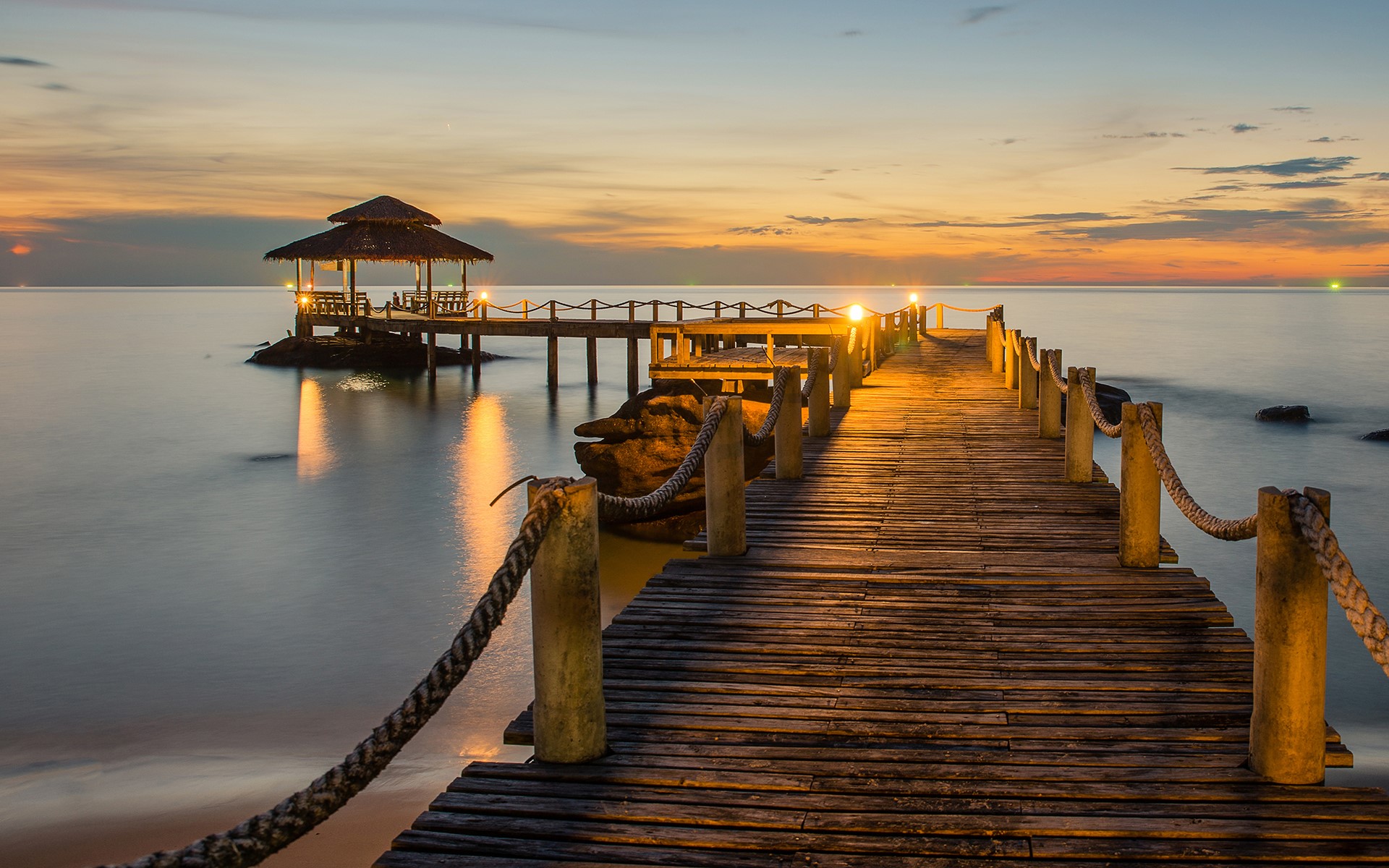 Wooden pier with gazebo over the sea at sunset HD Wallpaper