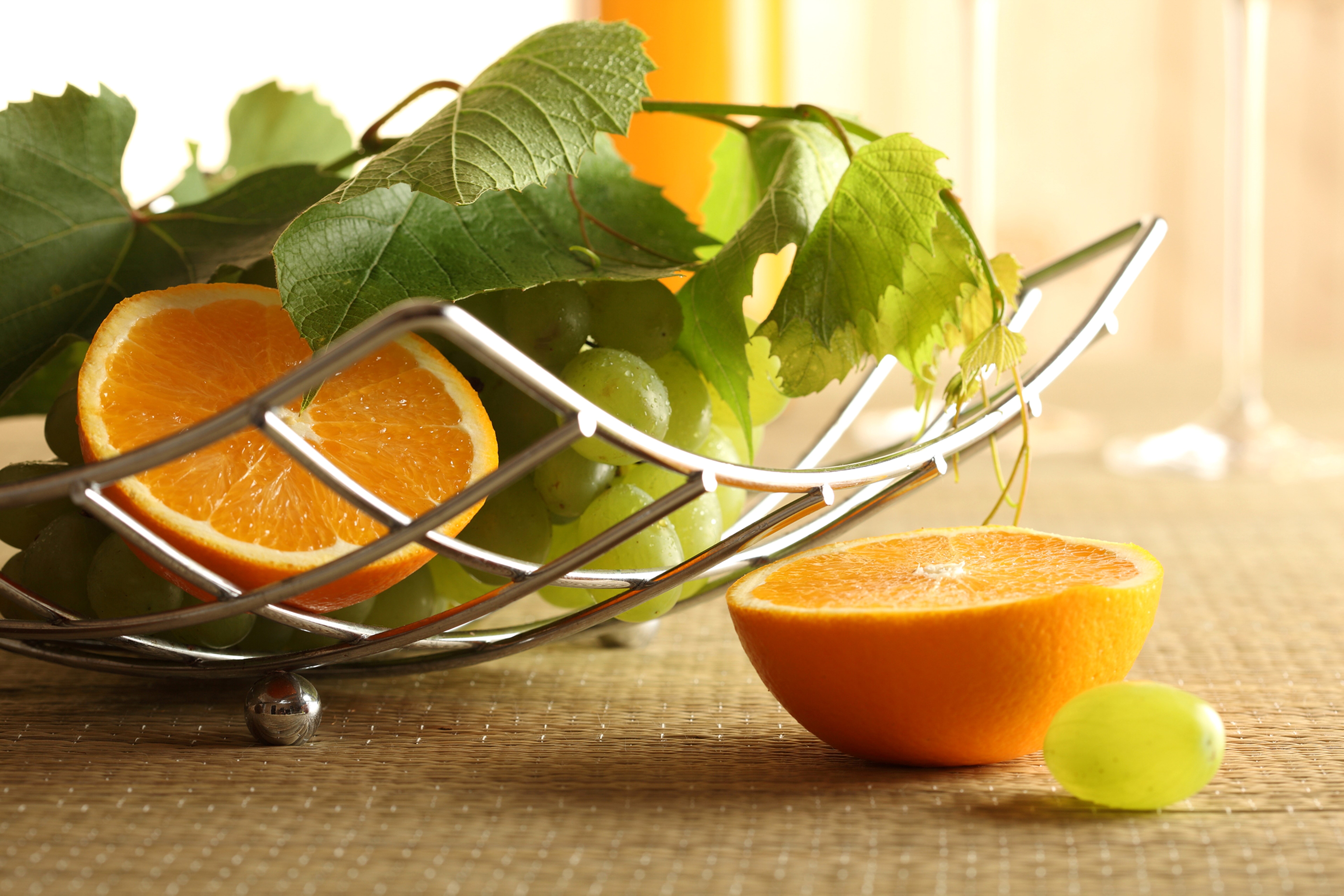 Oranges and Grapes in a Fruit Basket HD Wallpaper