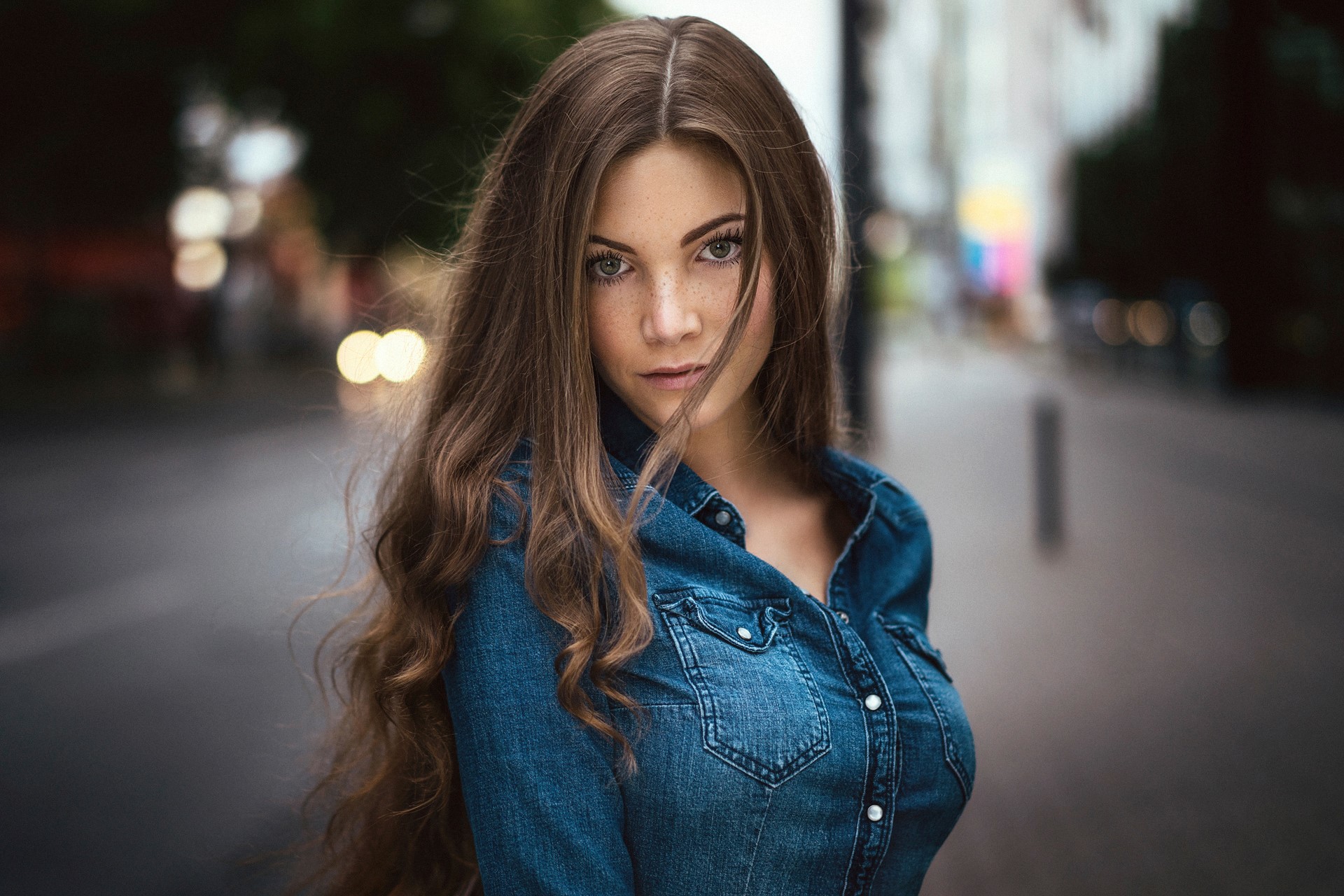 Woman with long brown hair wearing a denim shirt HD Wallpaper