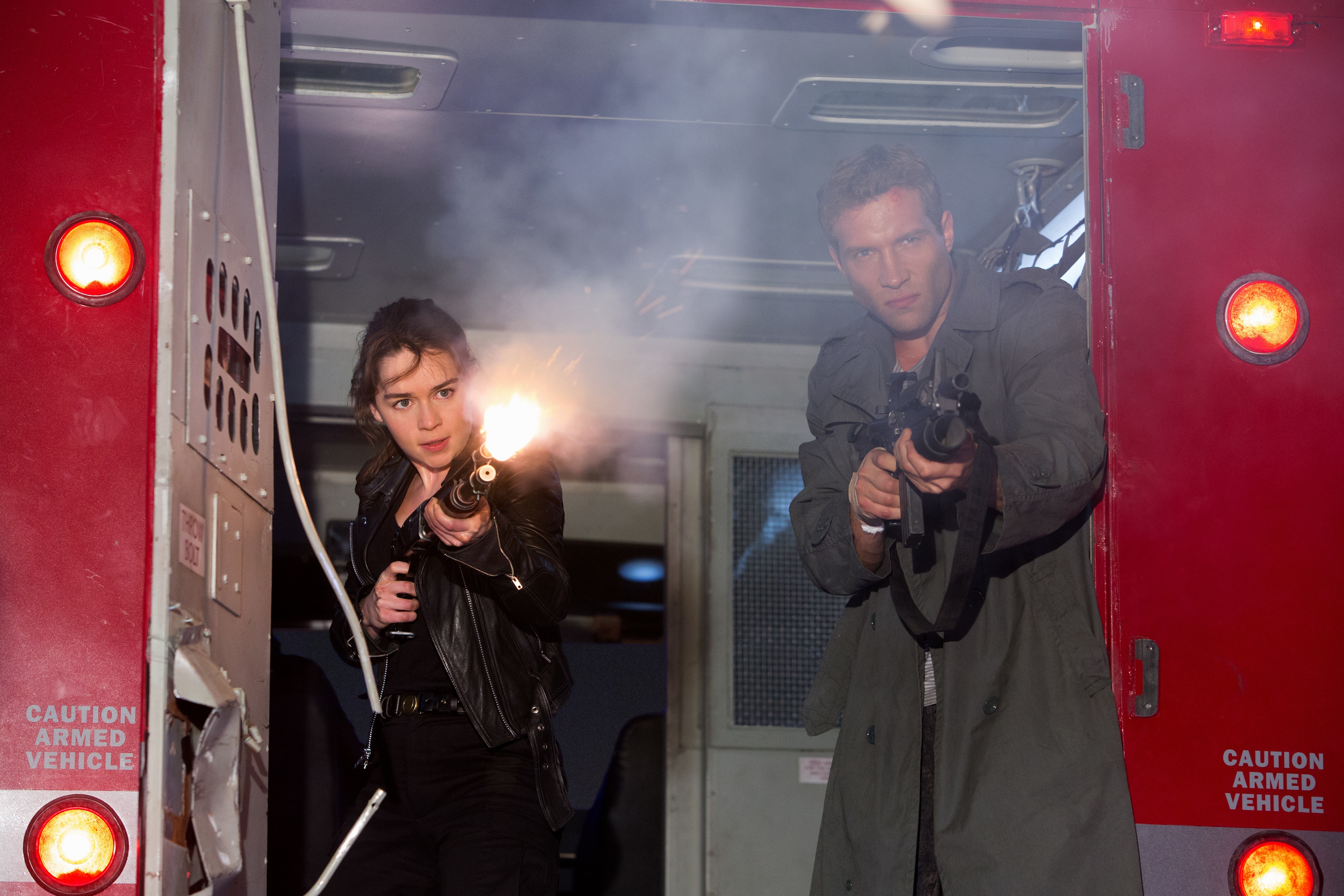 Sarah Connor and Kyle Reese firing weapons in Terminator Genisys HD Wallpaper