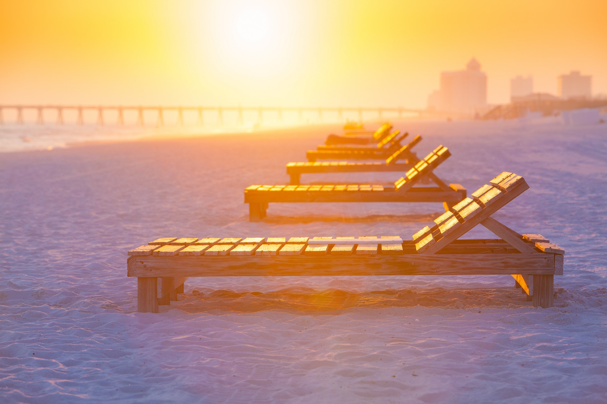 Beach chairs on Pensacola Beach at sunset HD Wallpaper