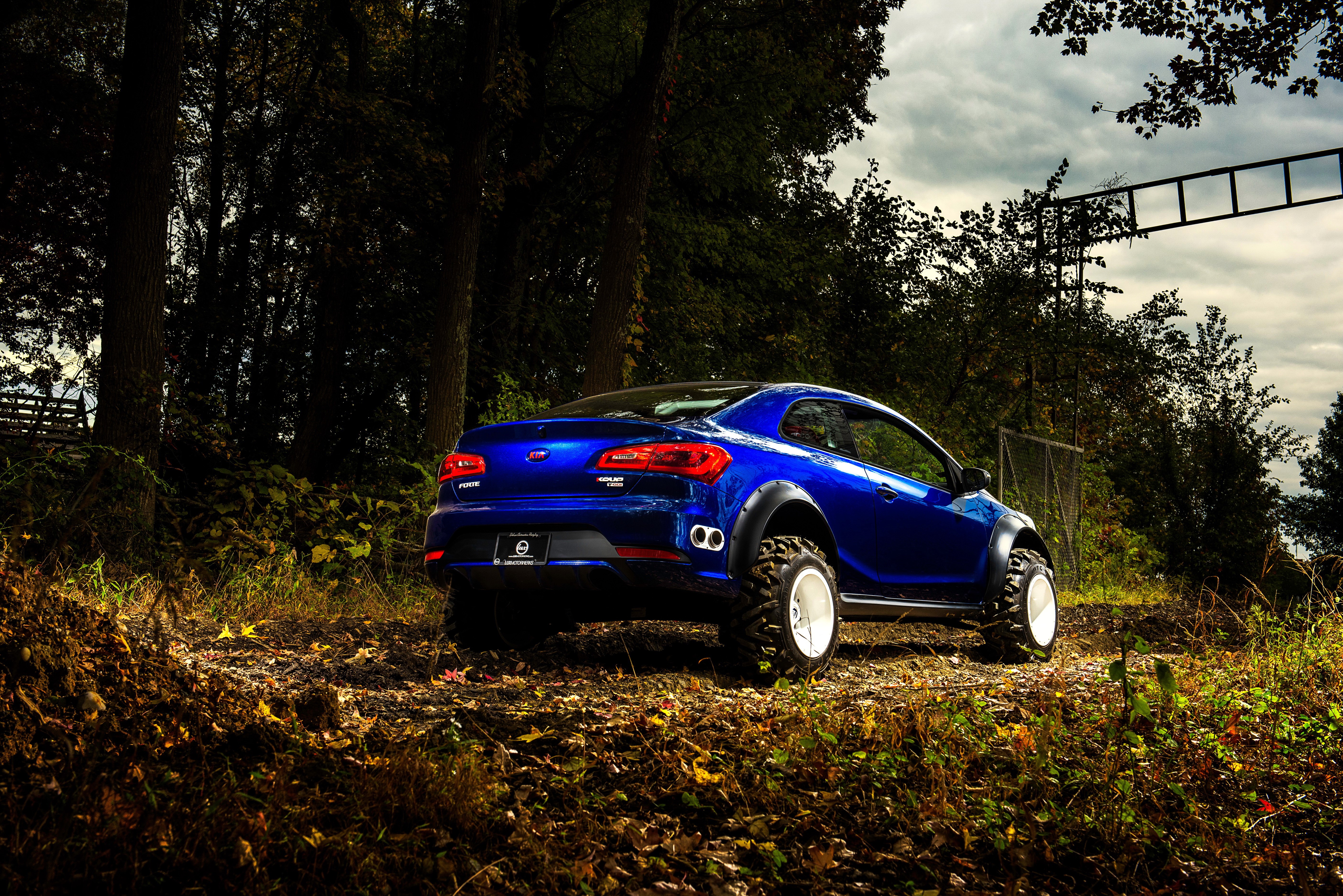 2015 Kia Forte Koup Mud Bogger in Autumn Forest HD Wallpaper