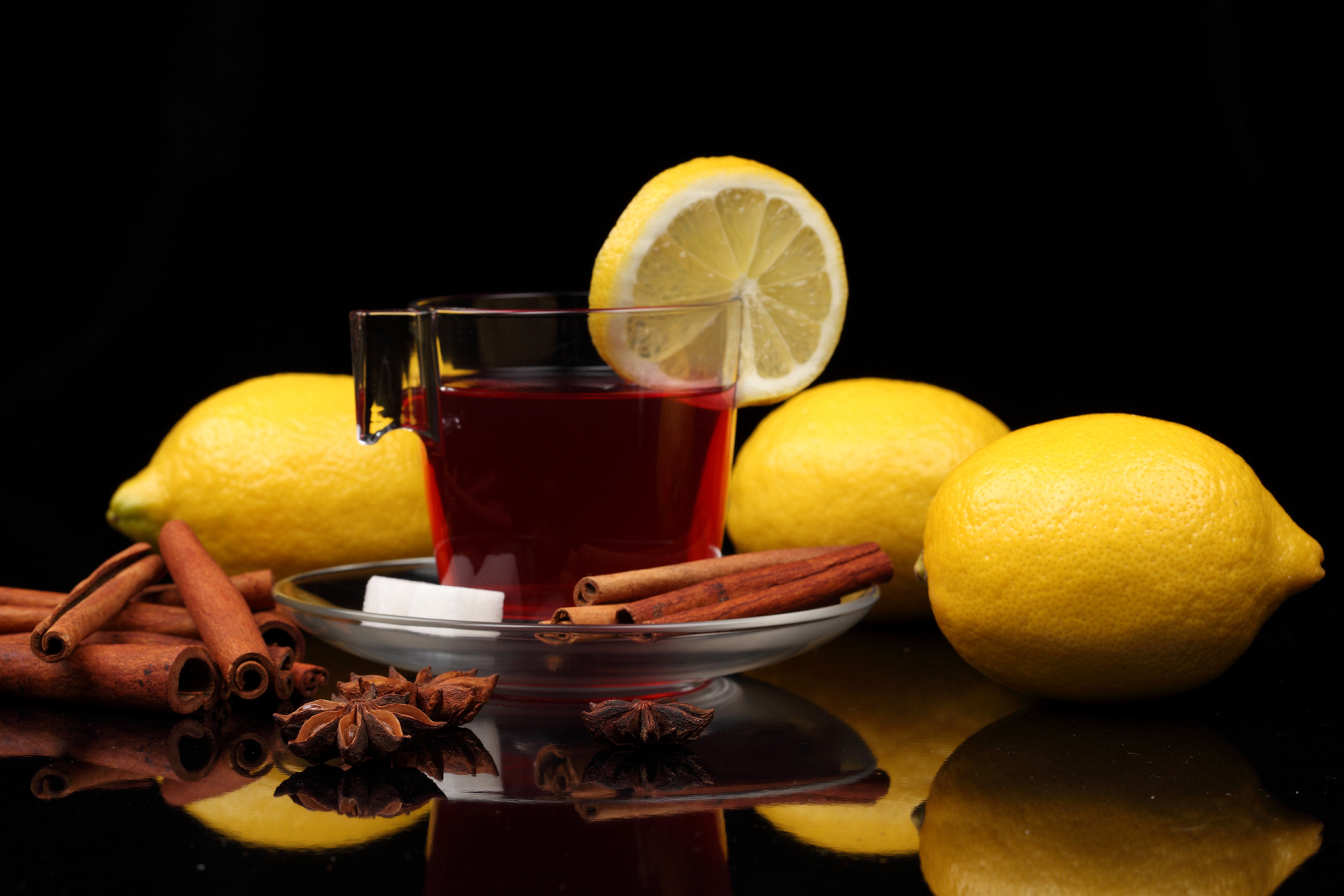 Tea with lemon, cinnamon, and star anise HD Wallpaper