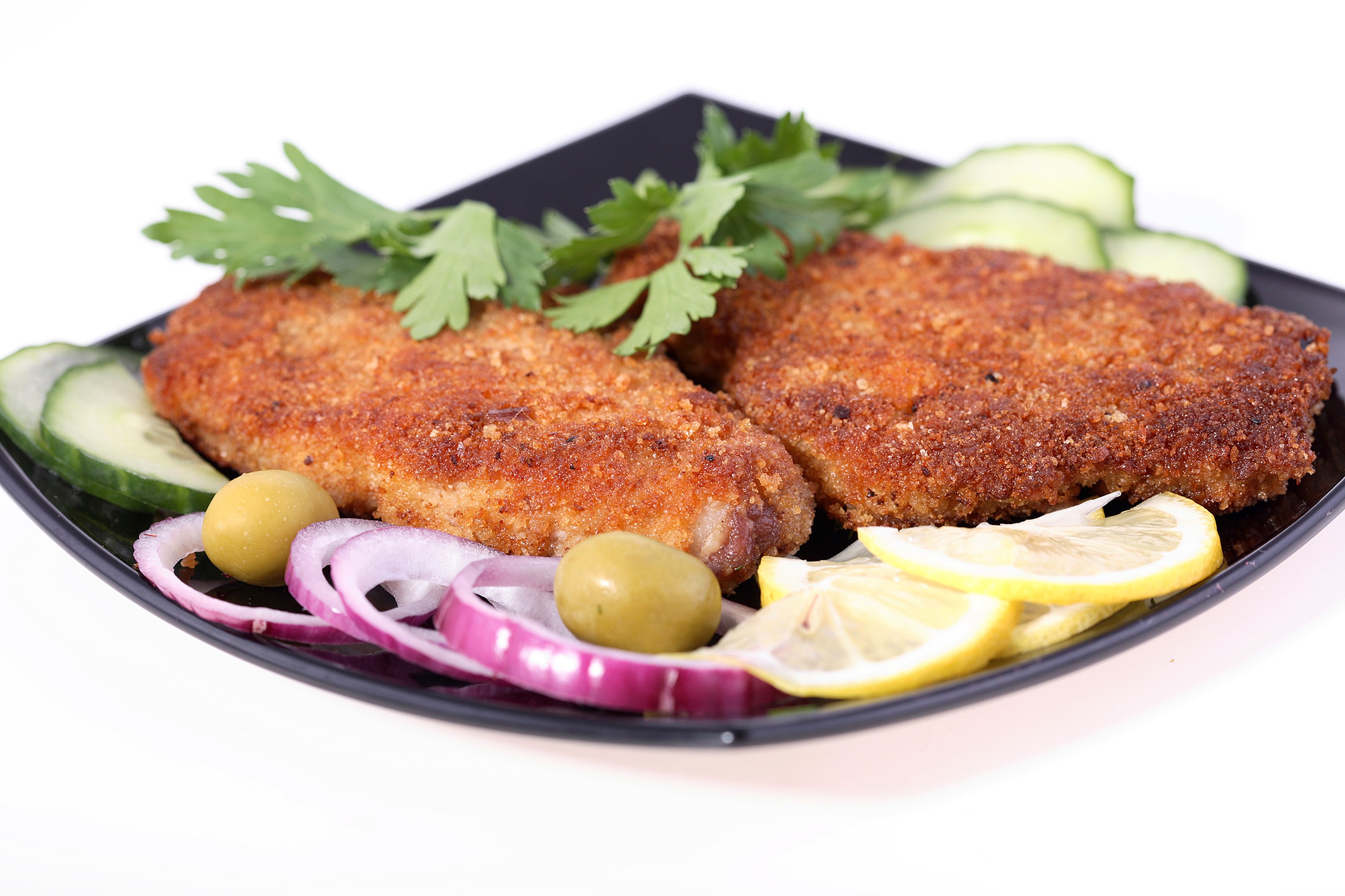 Breaded meat cutlets with lemon and onion HD Wallpaper