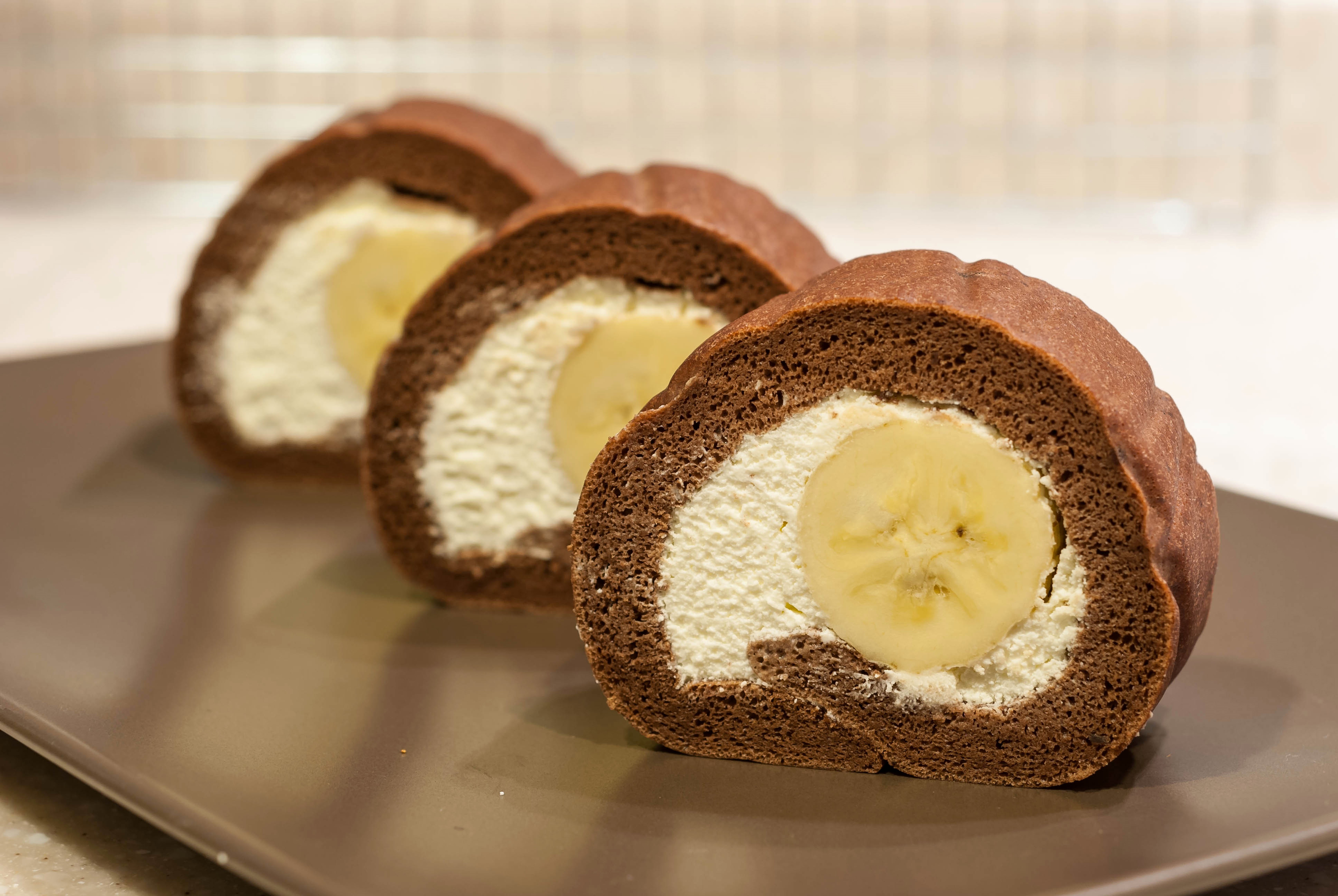 Three Chocolate Swiss Rolls with Banana HD Wallpaper