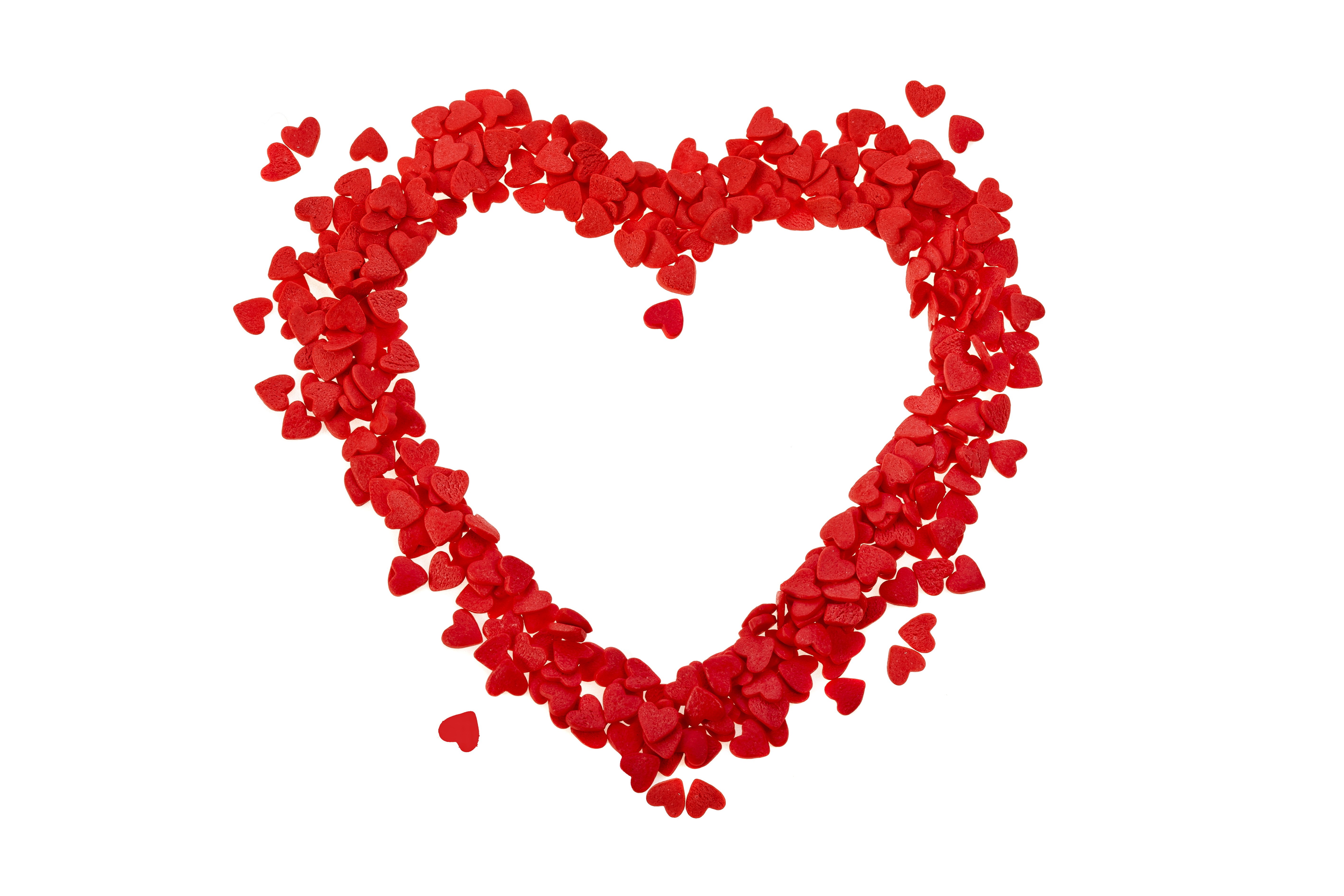 Red heart sprinkles forming a heart shape HD Wallpaper