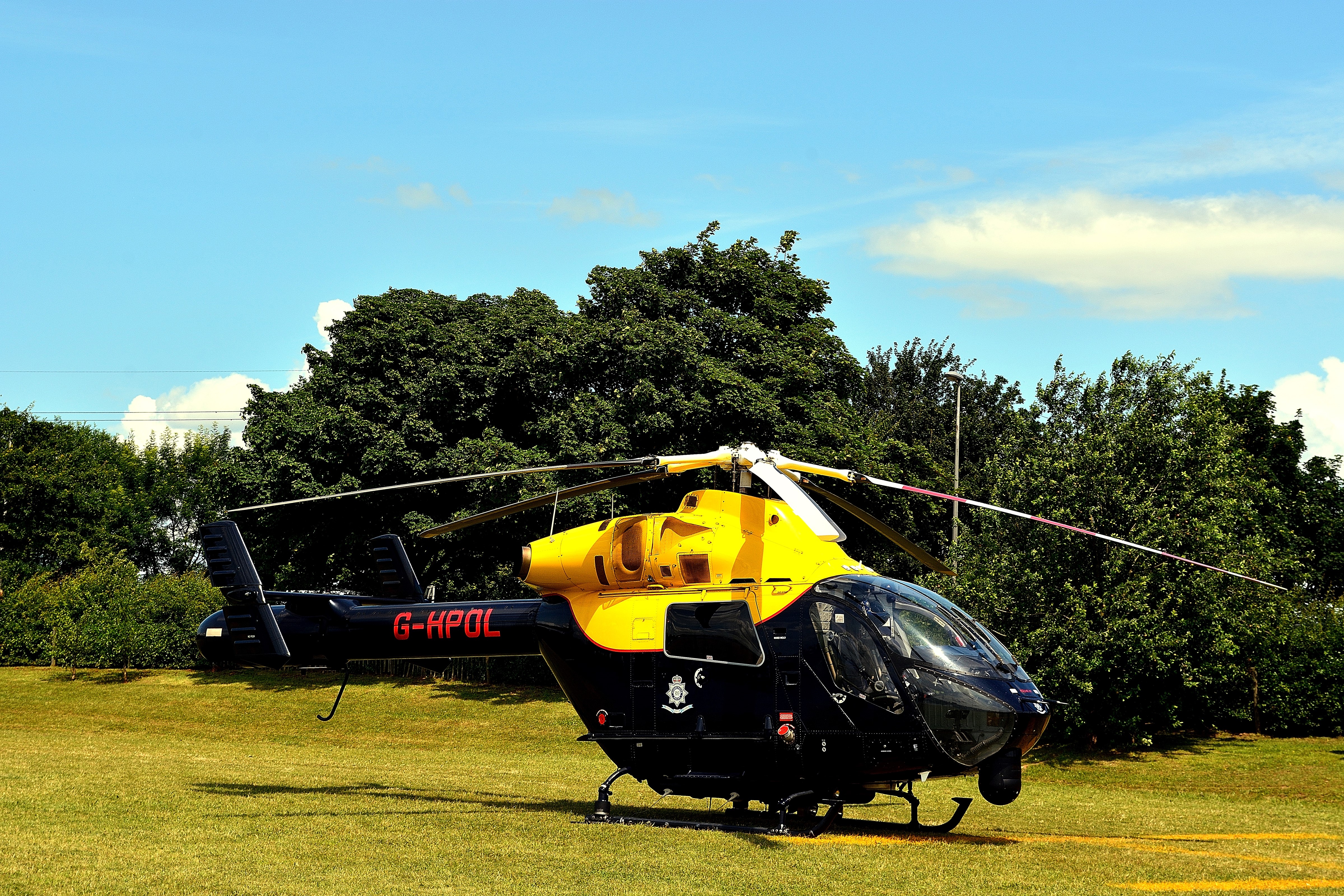 Police Helicopter G-HPOL on Grass HD Wallpaper