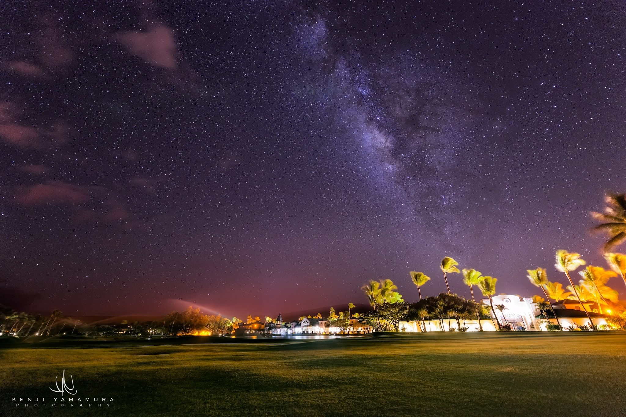 Milky Way over a resort at night HD Wallpaper