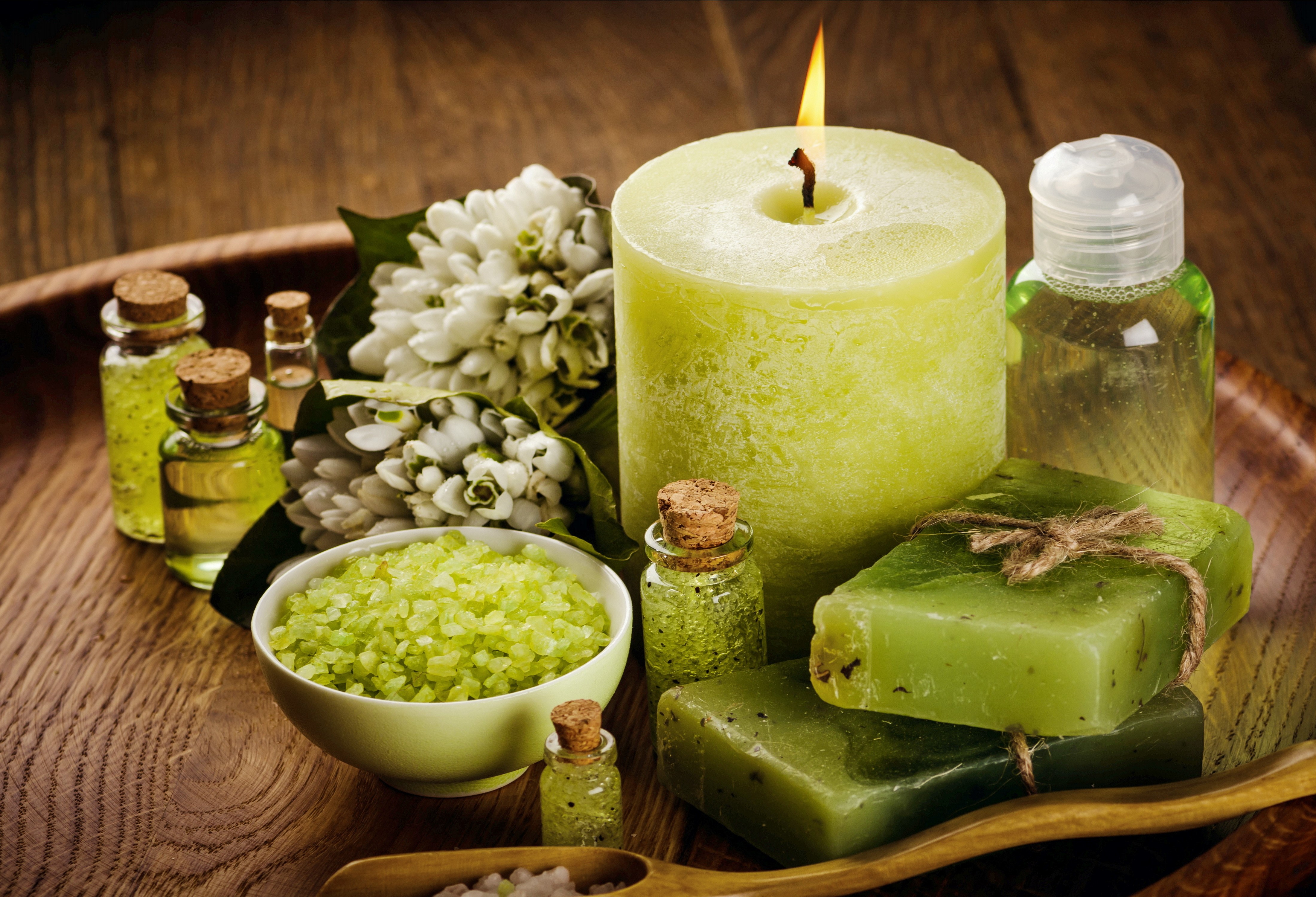 Spa items with candle and flowers HD Wallpaper