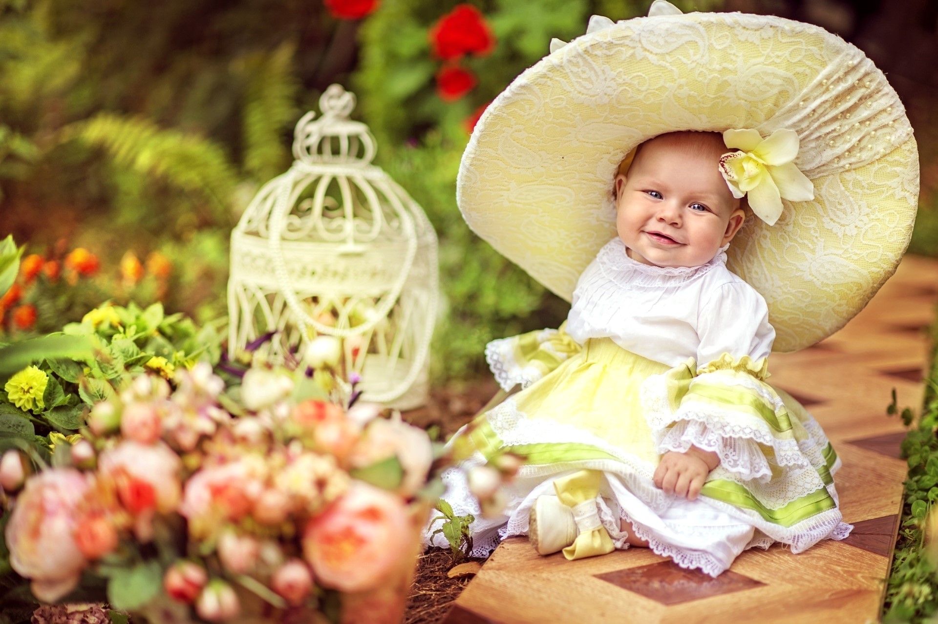 Baby girl in a yellow dress and hat HD Wallpaper