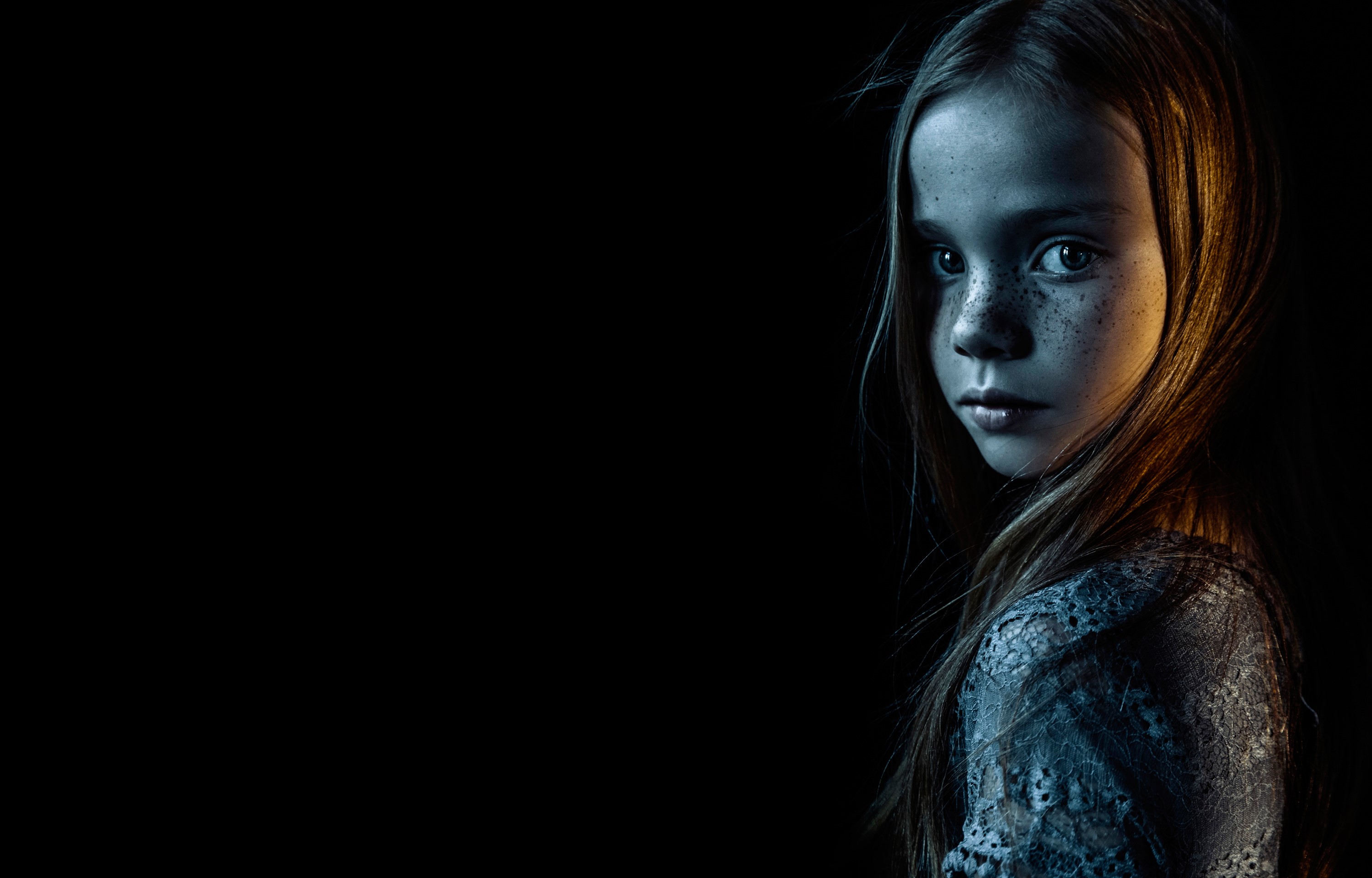 Young Girl in Dramatic Lighting with Freckles HD Wallpaper