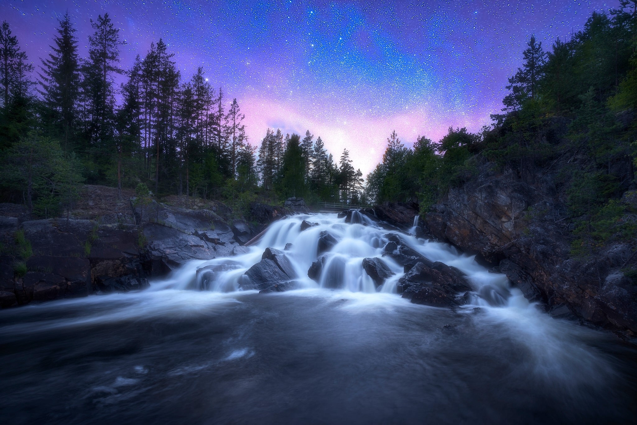 Waterfall under a starry sky in Ringerike, Norway HD Wallpaper