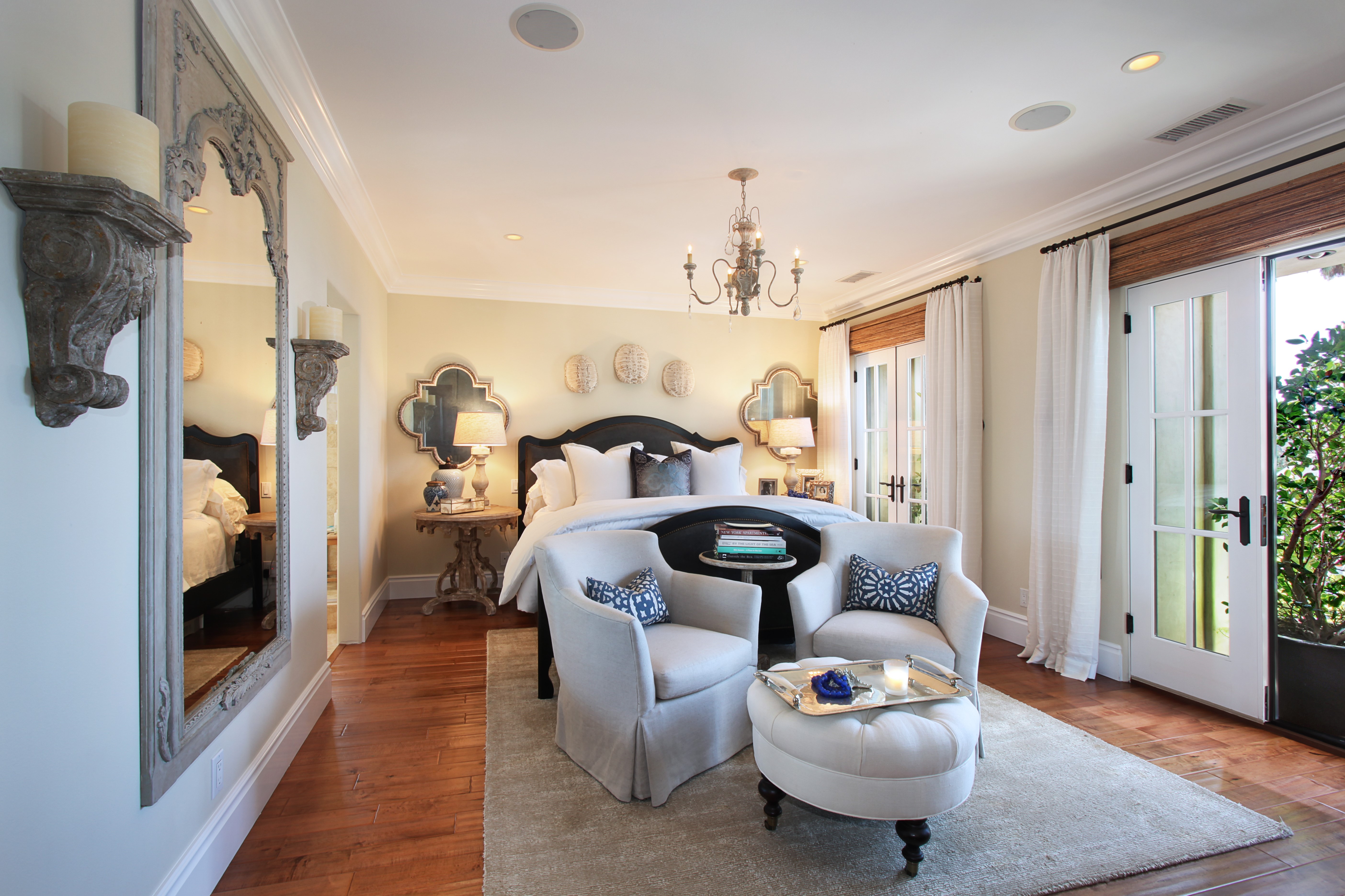 Bedroom with Chandelier, Armchairs, and Bed HD Wallpaper