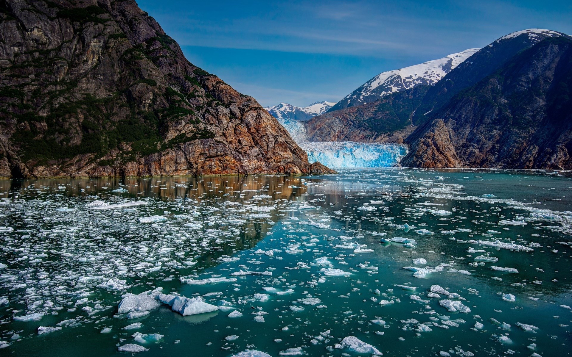 Glacier and icebergs in a mountain fjord HD Wallpaper