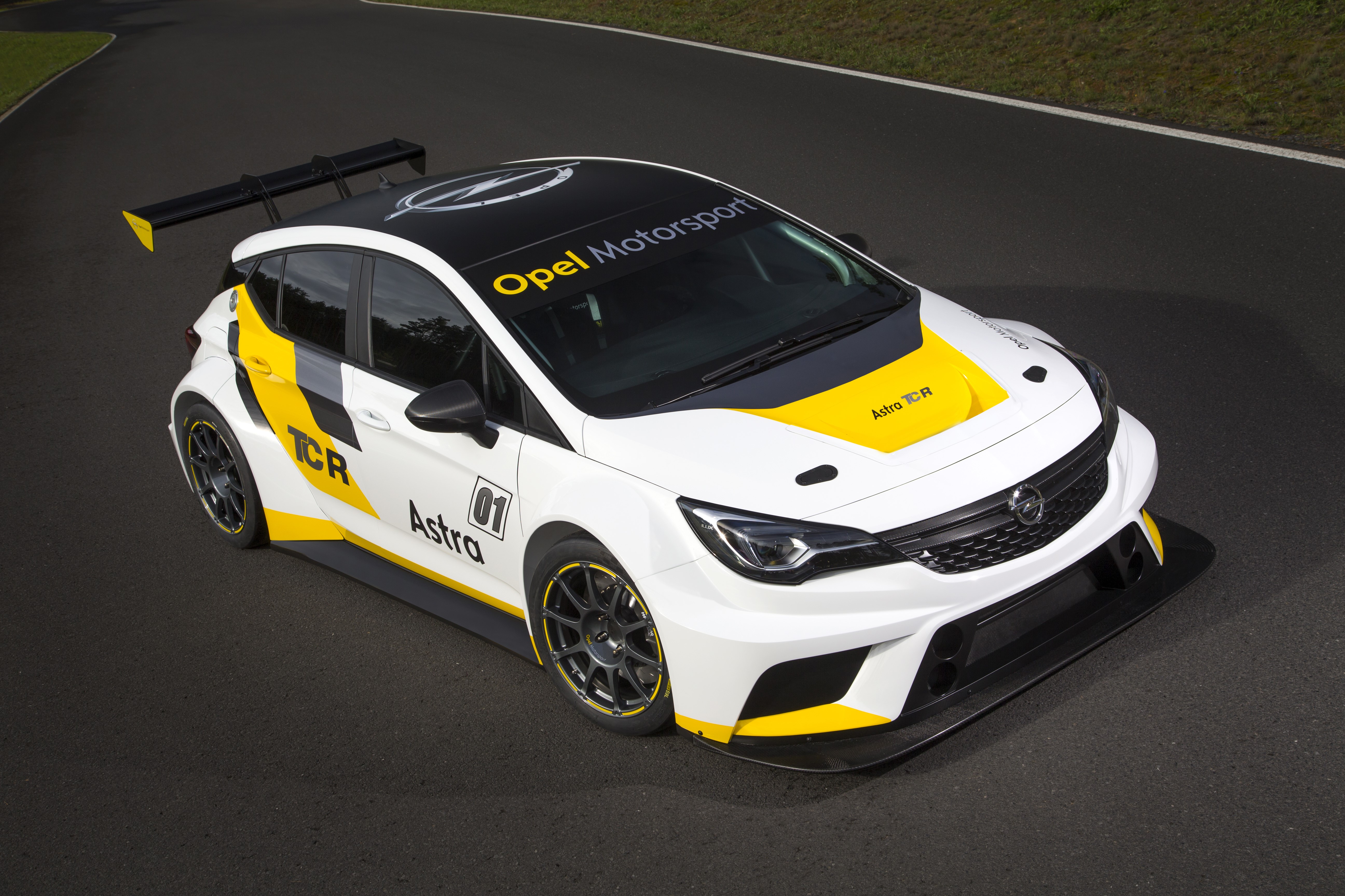 Opel Astra TCR race car on a track HD Wallpaper