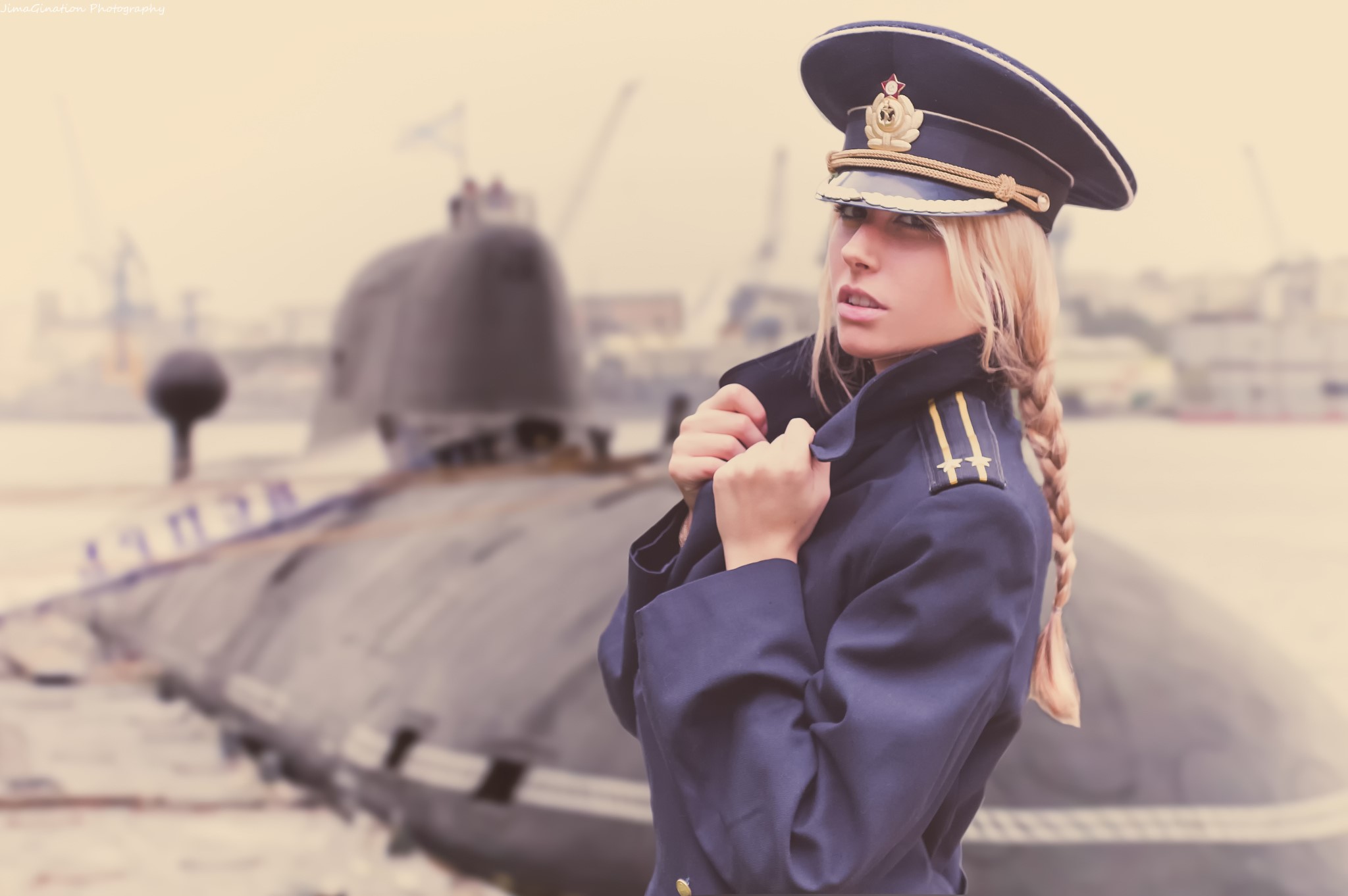 Woman in military uniform with submarine HD Wallpaper