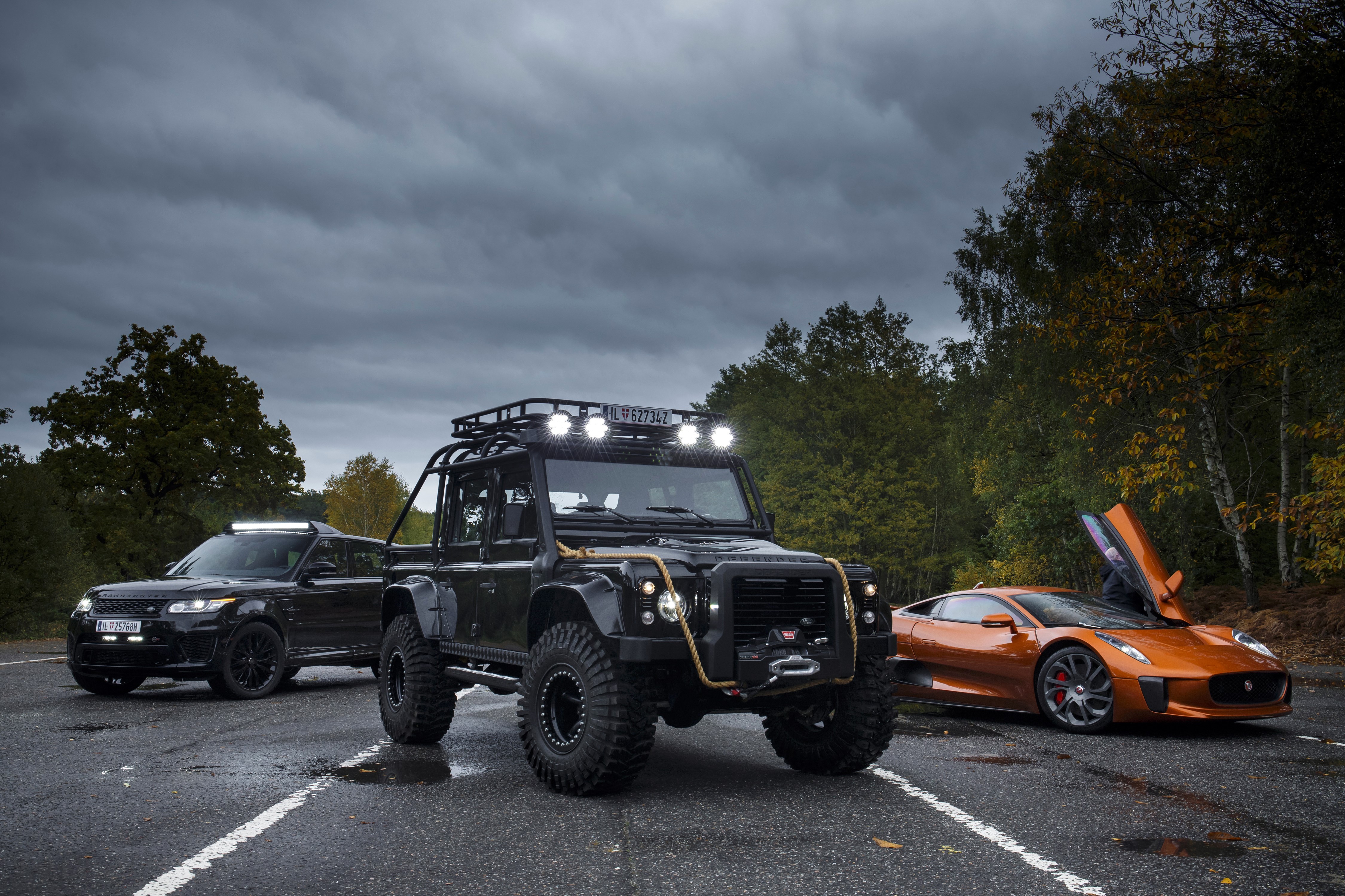 Jaguar C-X75 and modified Land Rover Defender HD Wallpaper