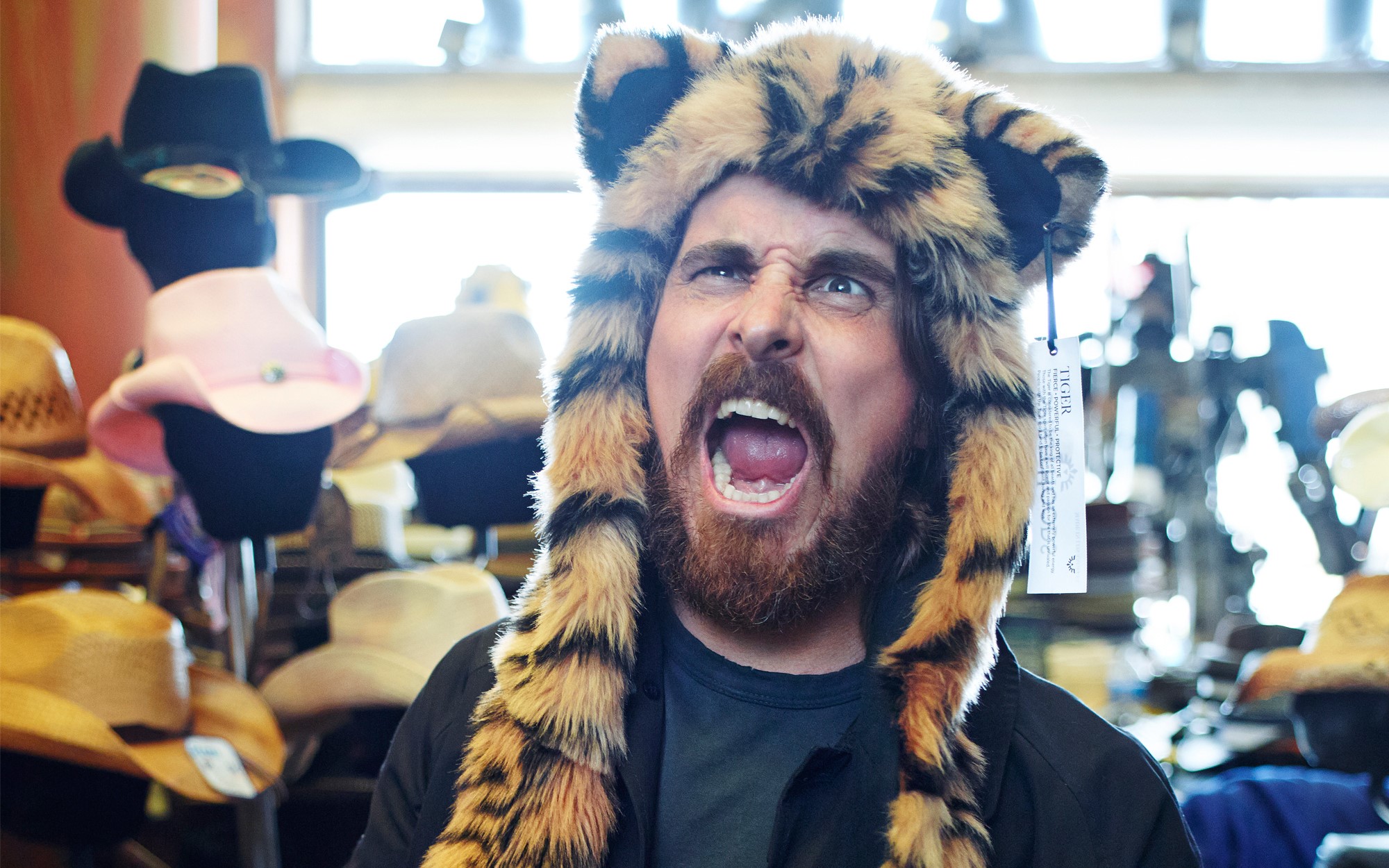 Christian Bale wearing a tiger hat HD Wallpaper