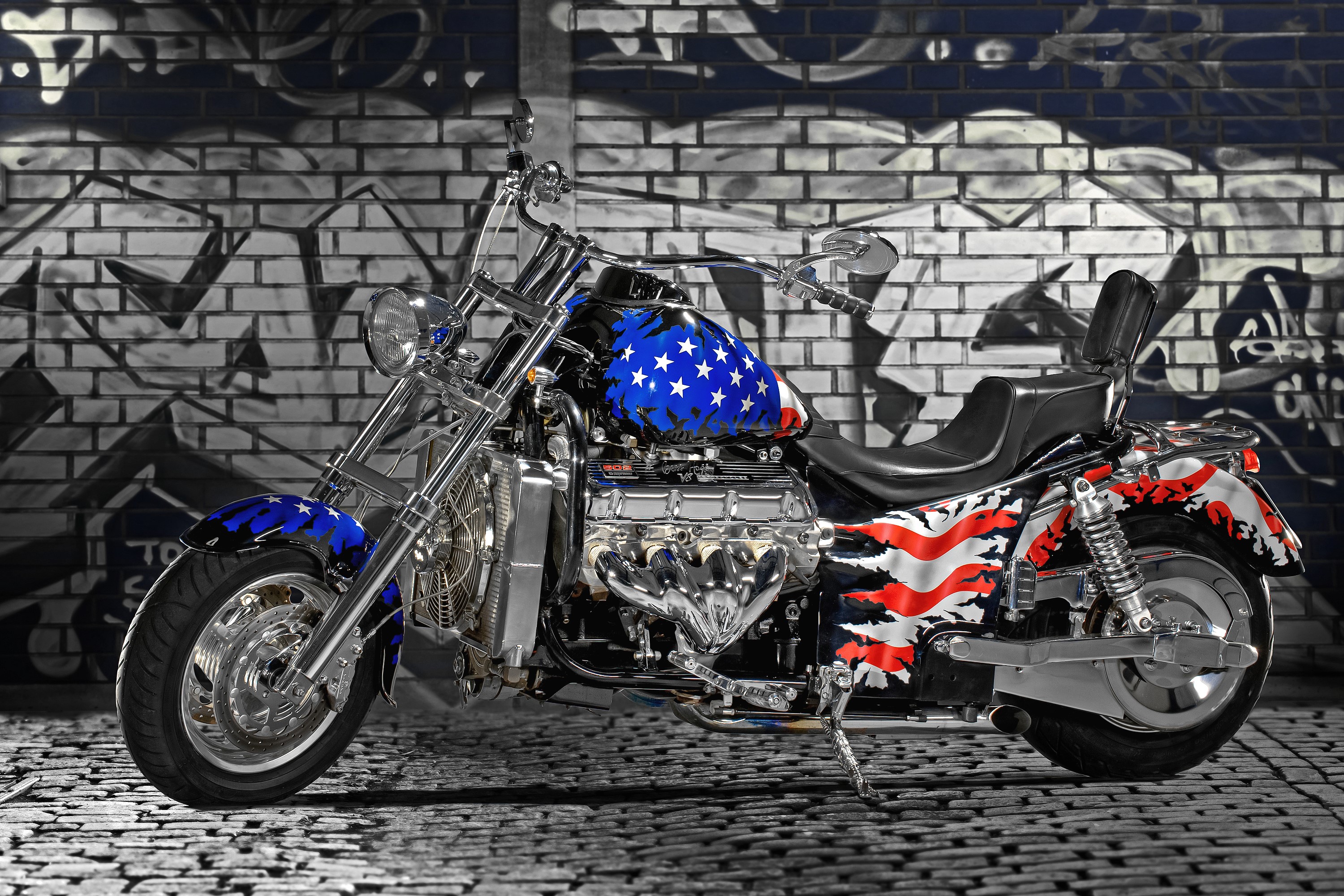 Motorcycle with USA flag paint on graffiti wall HD Wallpaper