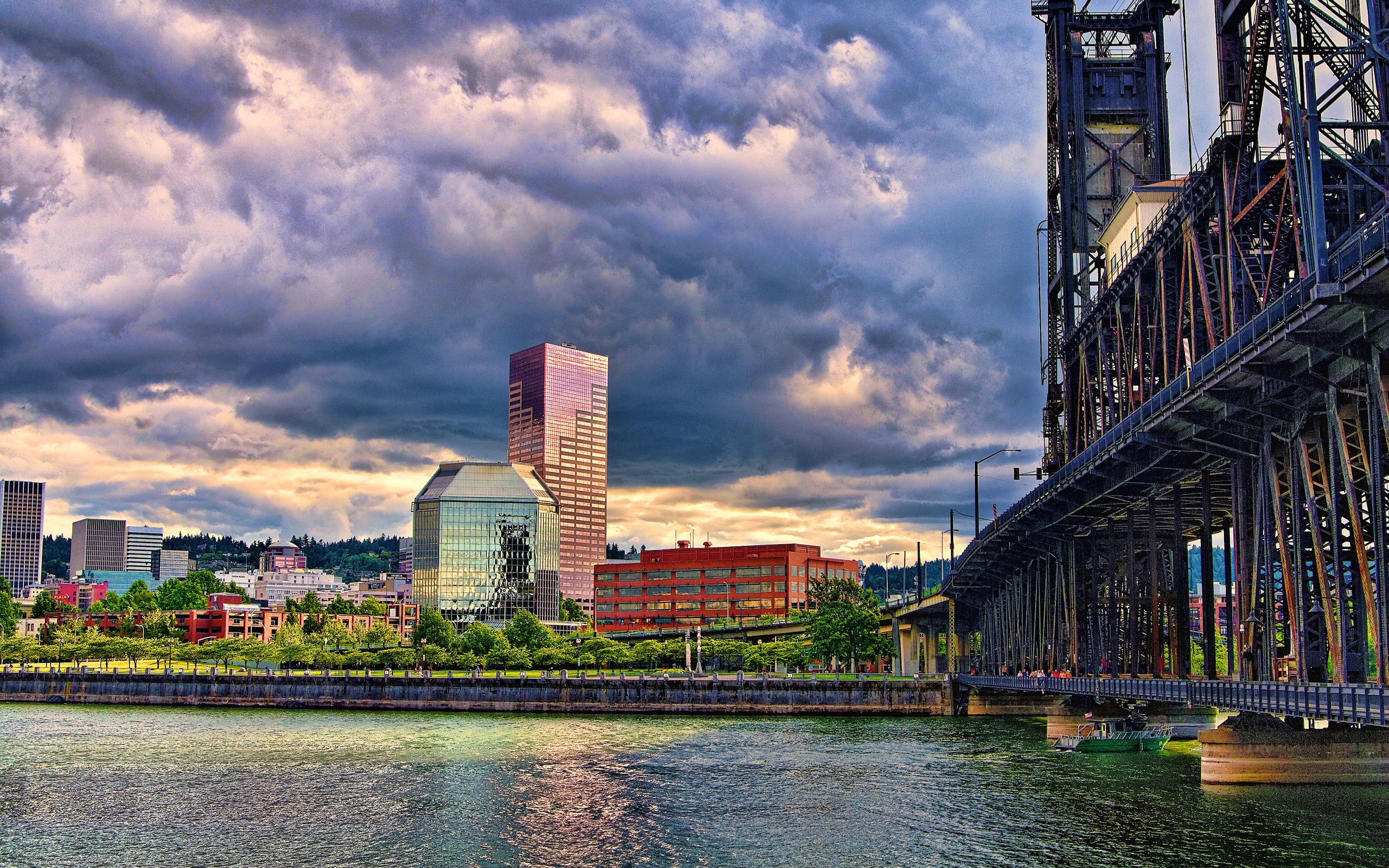 Portland skyline with bridge over river under cloudy sky HD Wallpaper