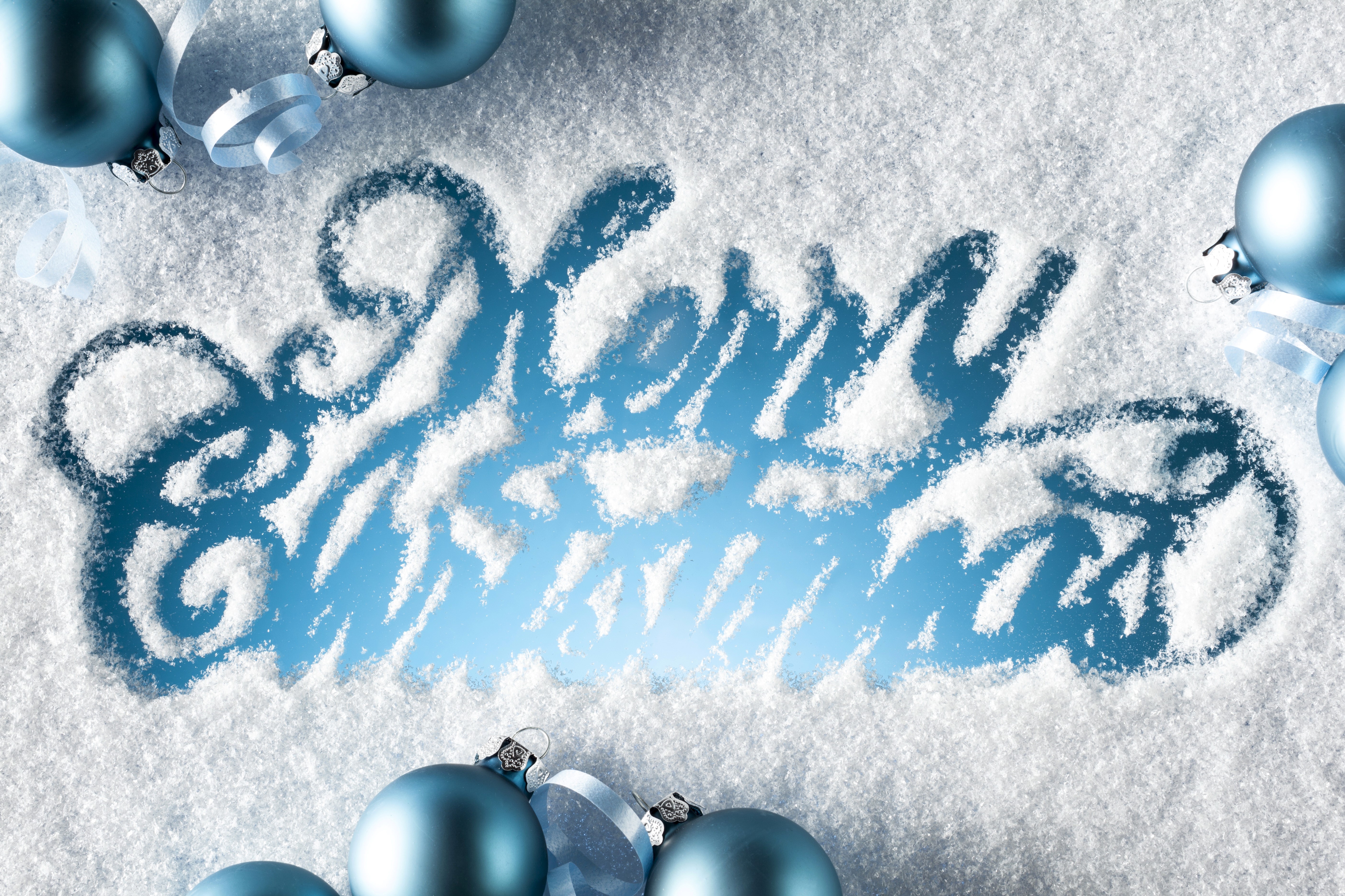 Merry Christmas snow text with blue ornaments HD Wallpaper