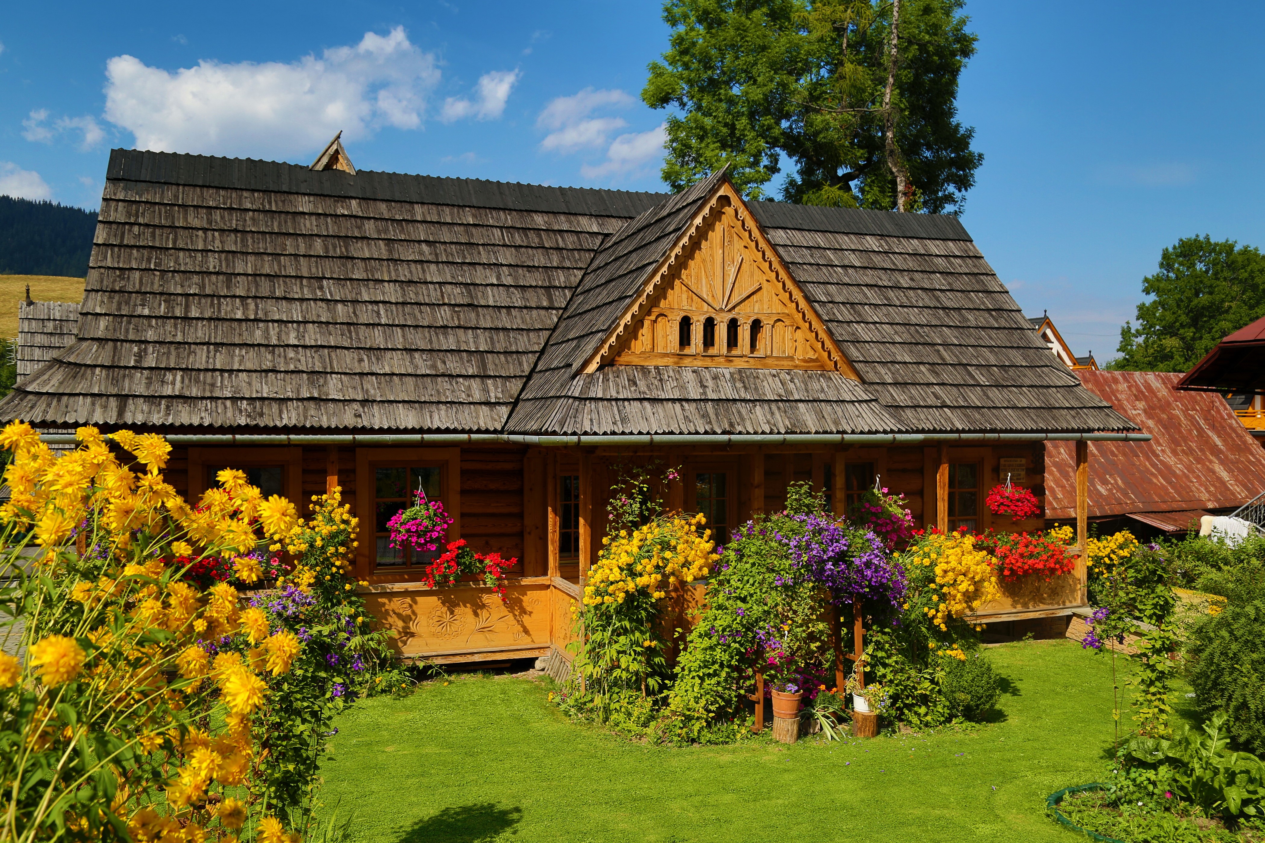 Wooden house with flowers in Zakopane, Poland HD Wallpaper