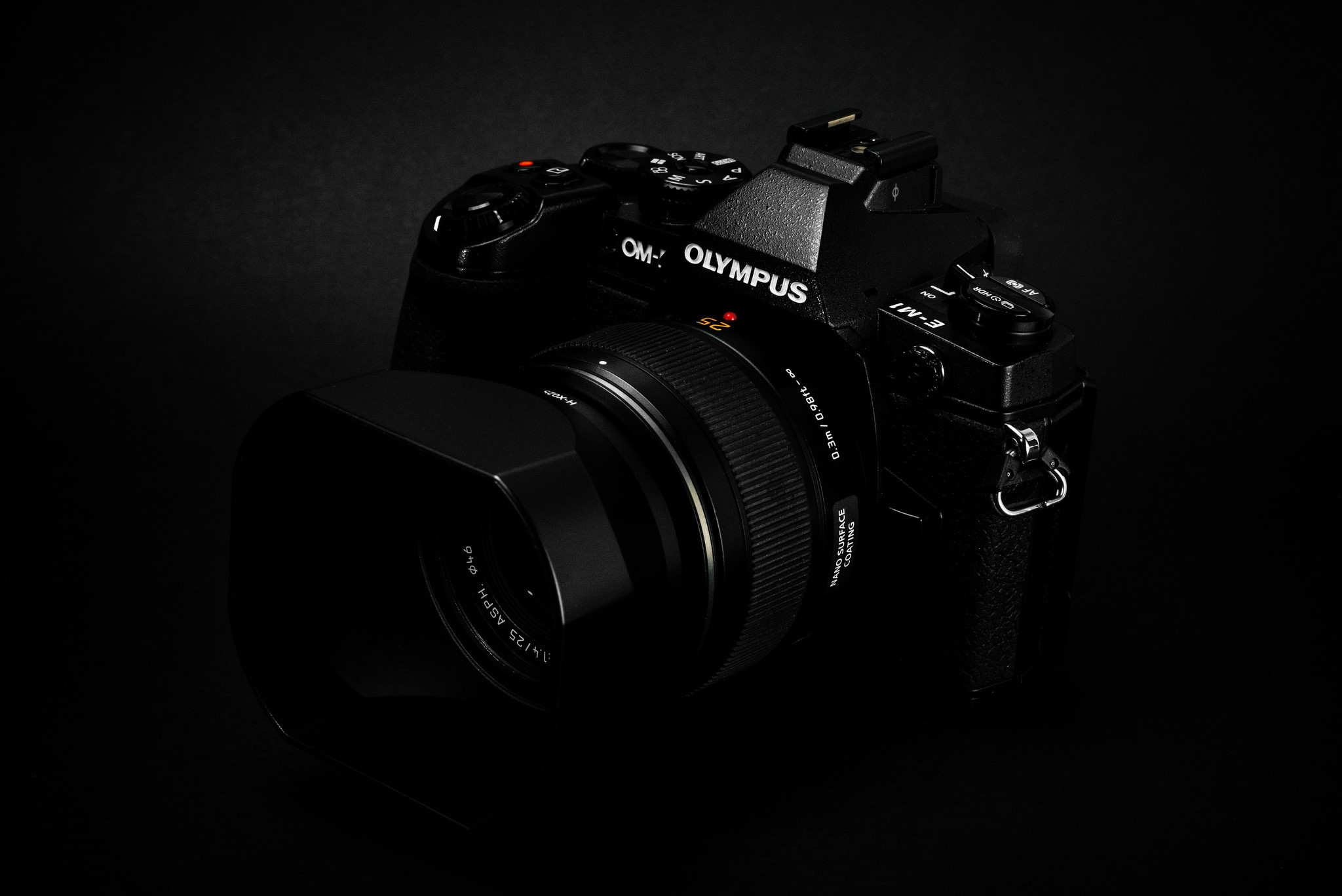 Olympus OM-D E-M1 Mark III camera with lens HD Wallpaper