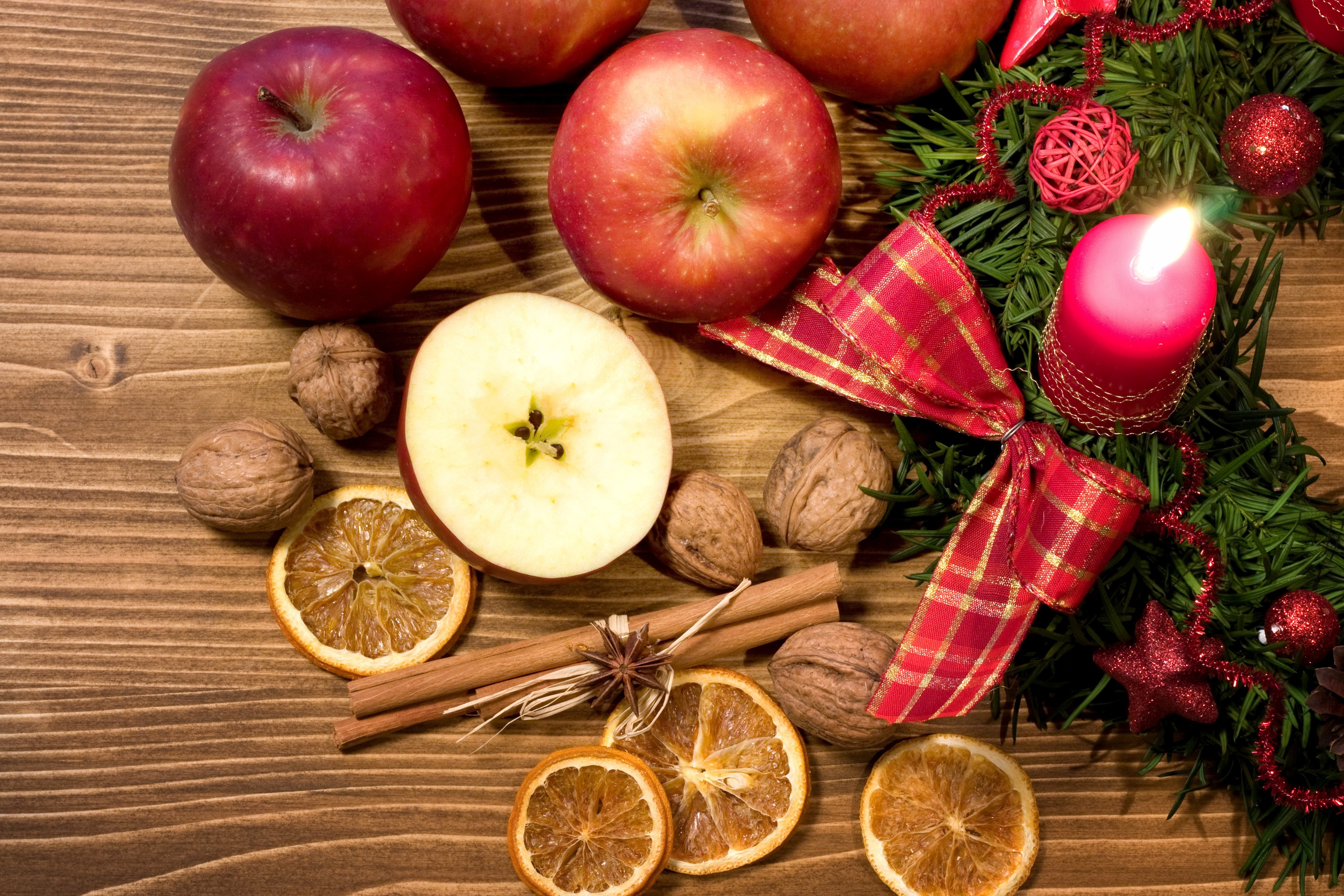 Christmas Apples, Nuts, Cinnamon, and Candle HD Wallpaper