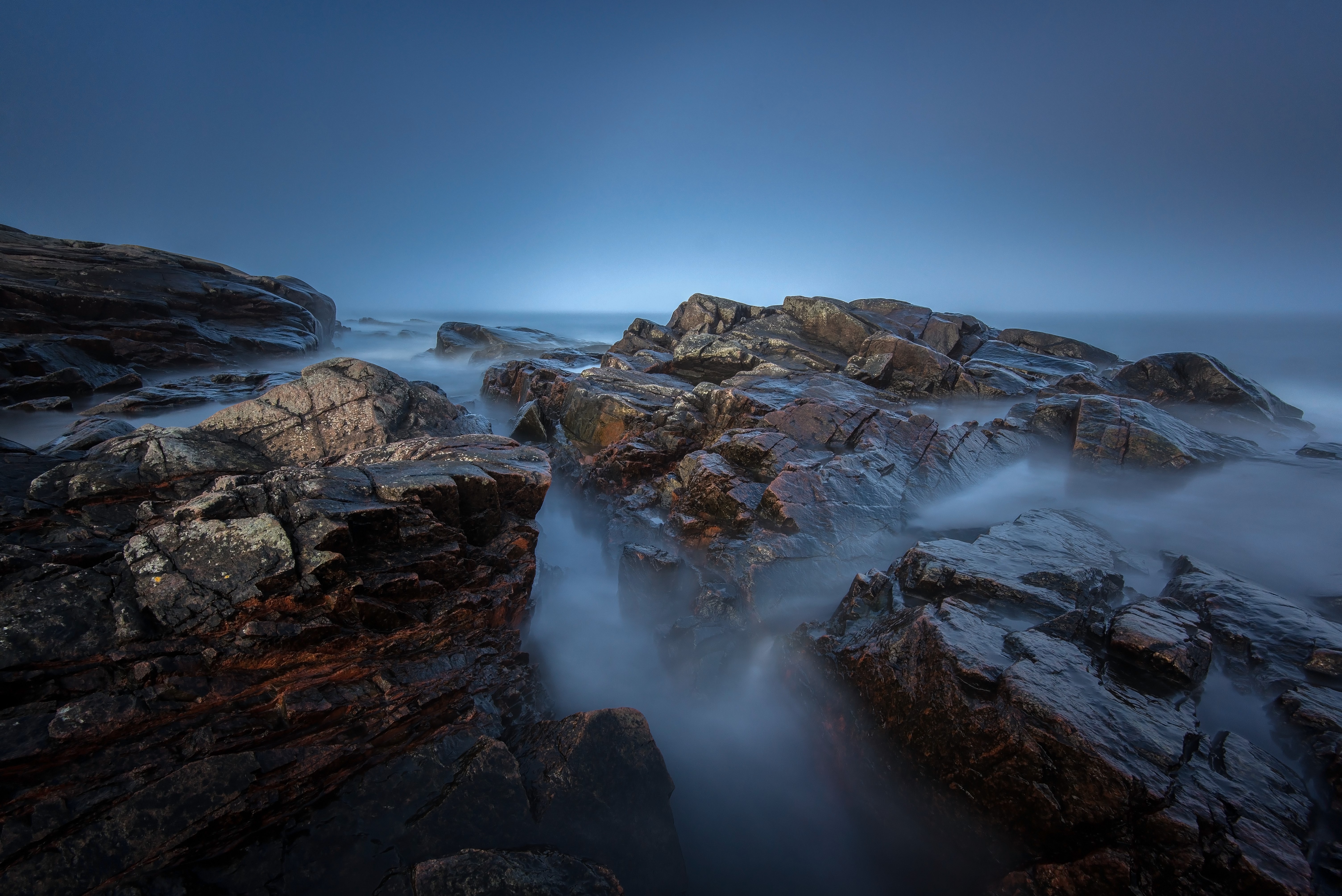 Rocky Coastline with Foggy Ocean HD Wallpaper