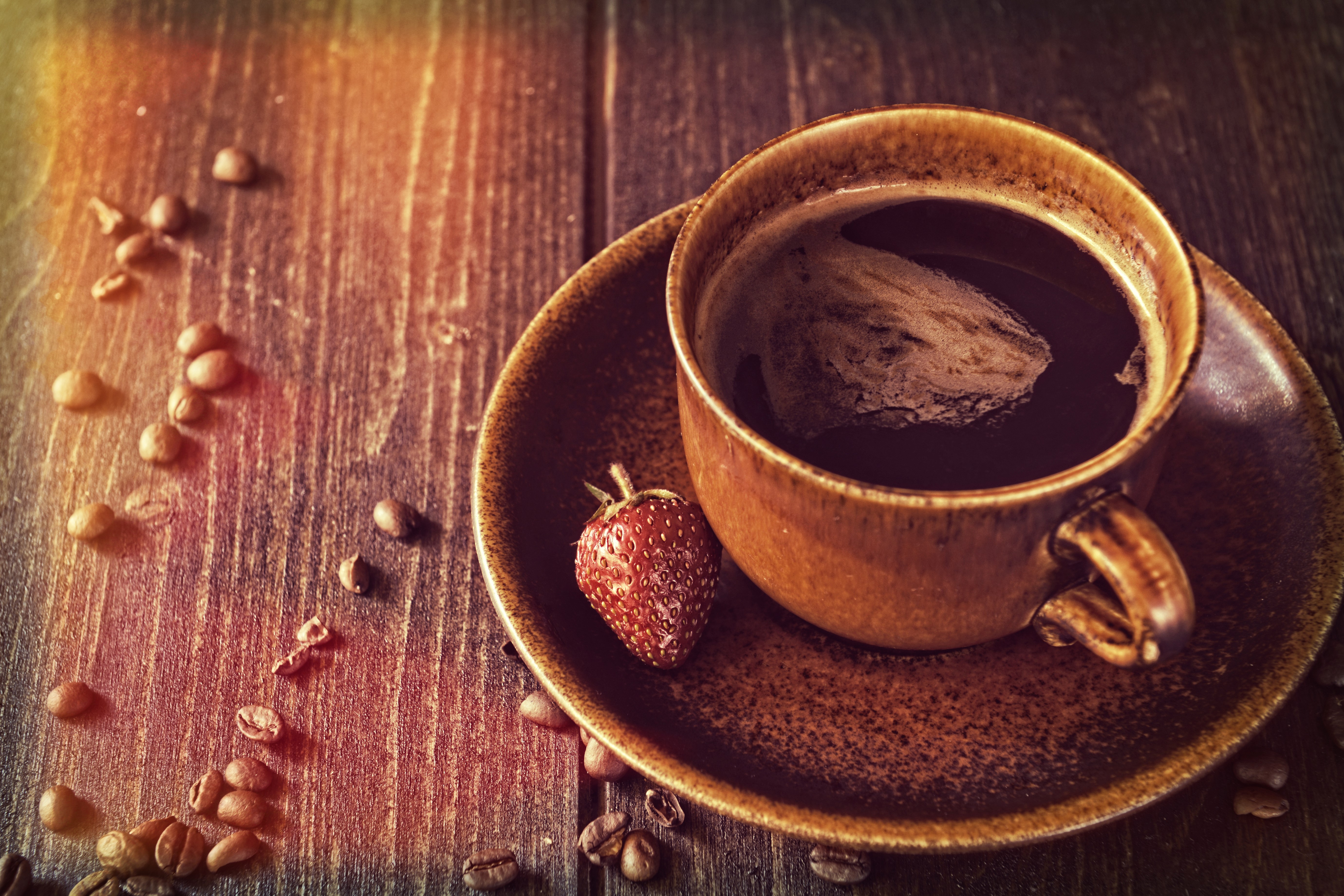 Coffee cup with strawberry and coffee beans HD Wallpaper
