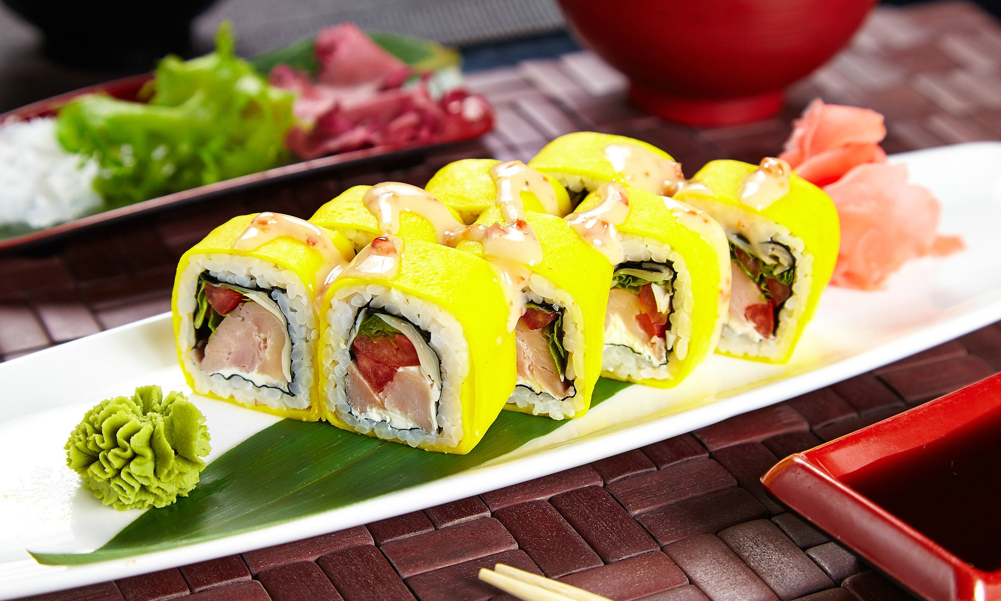 Yellow sushi rolls with wasabi and soy sauce HD Wallpaper