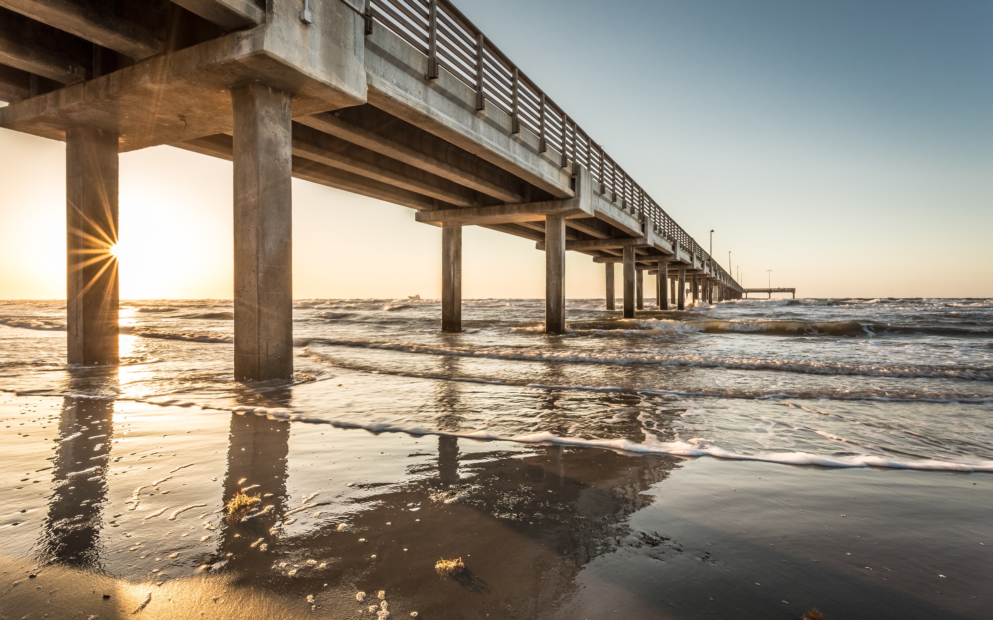 Pier over the ocean at sunset in Texas HD Wallpaper