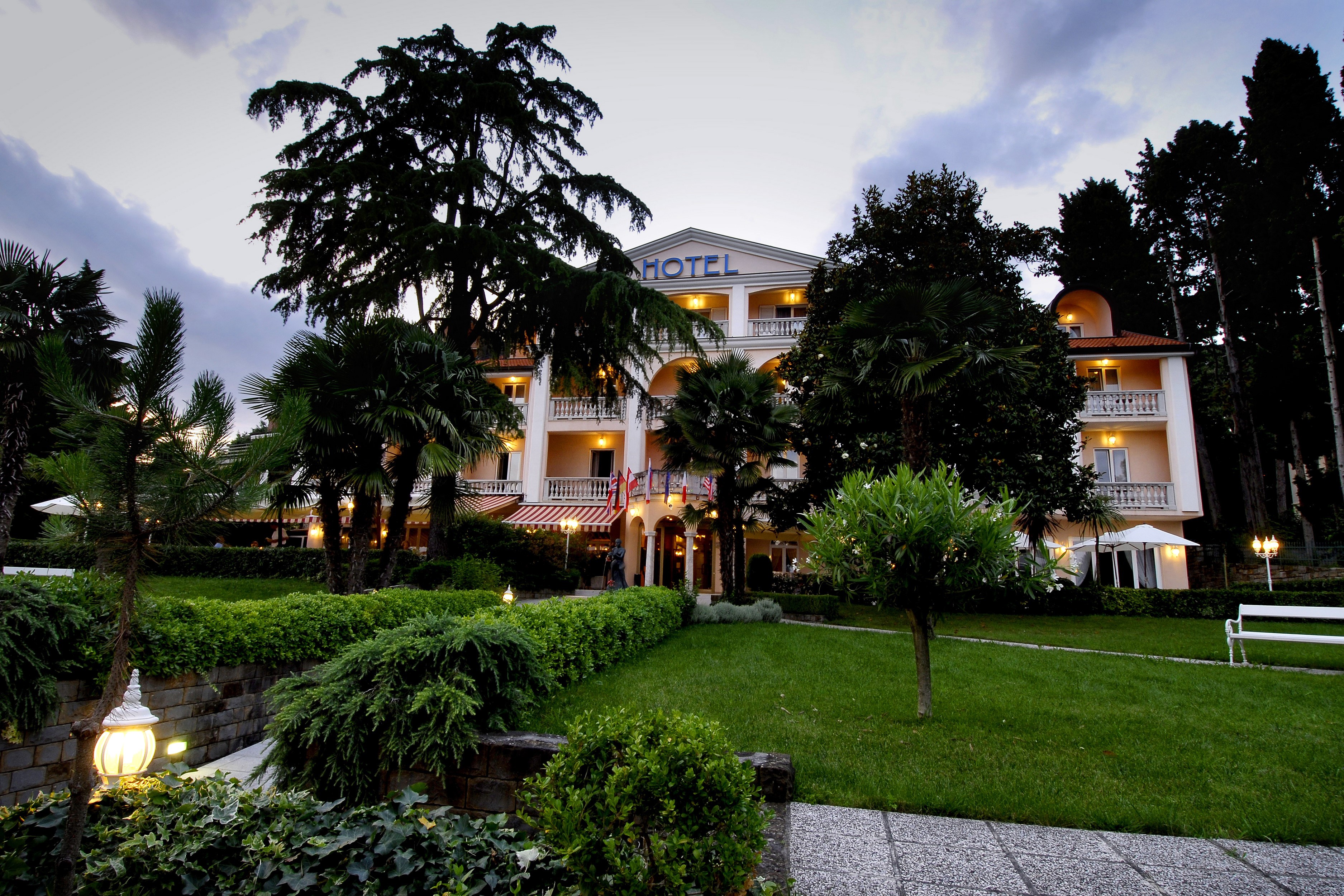 Hotel in Portoroz, Slovenia with gardens and trees HD Wallpaper