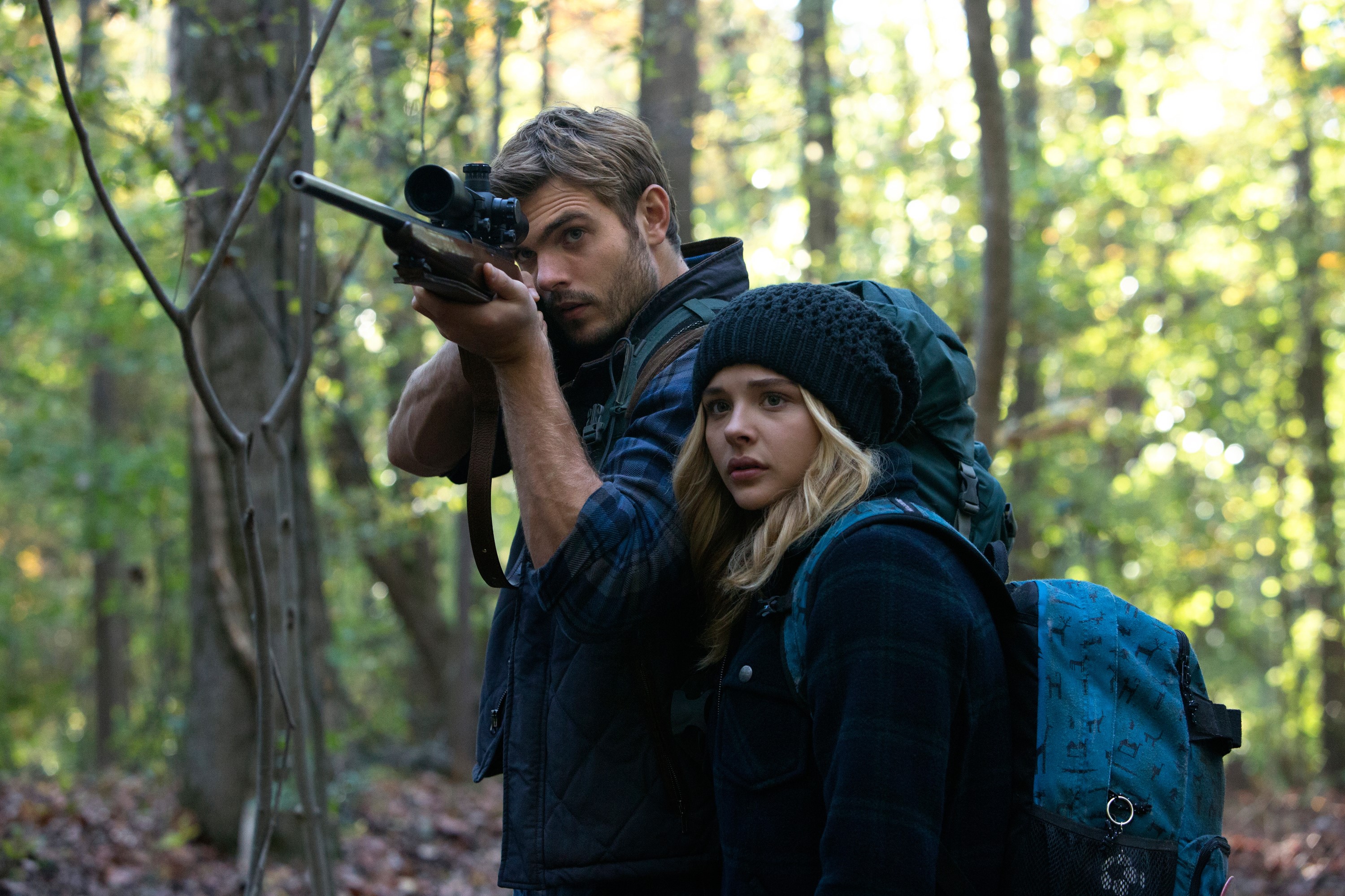 Chloe Grace Moretz with Sniper Rifle in Forest HD Wallpaper