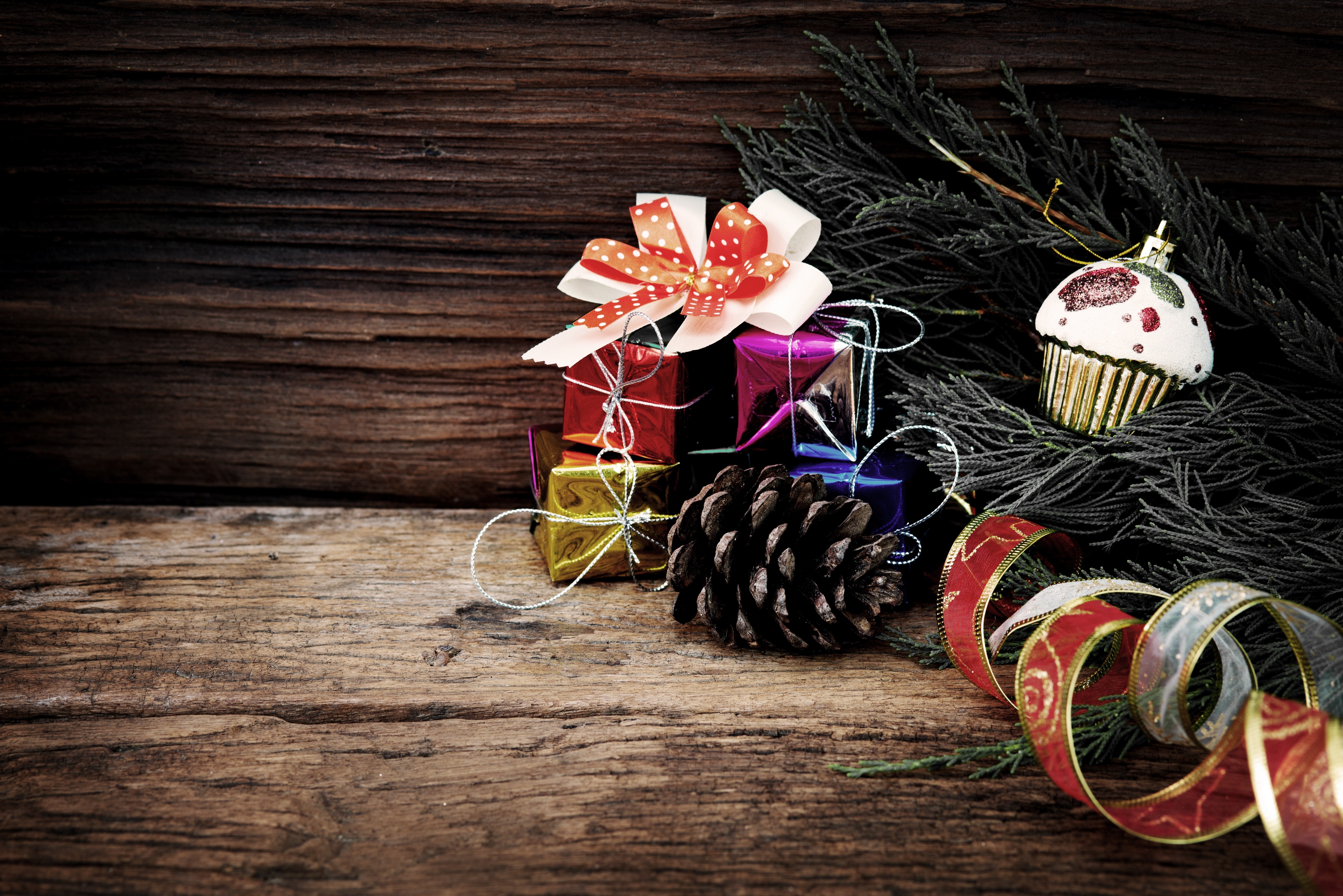 Christmas Gifts and Ornaments on Wooden Surface HD Wallpaper