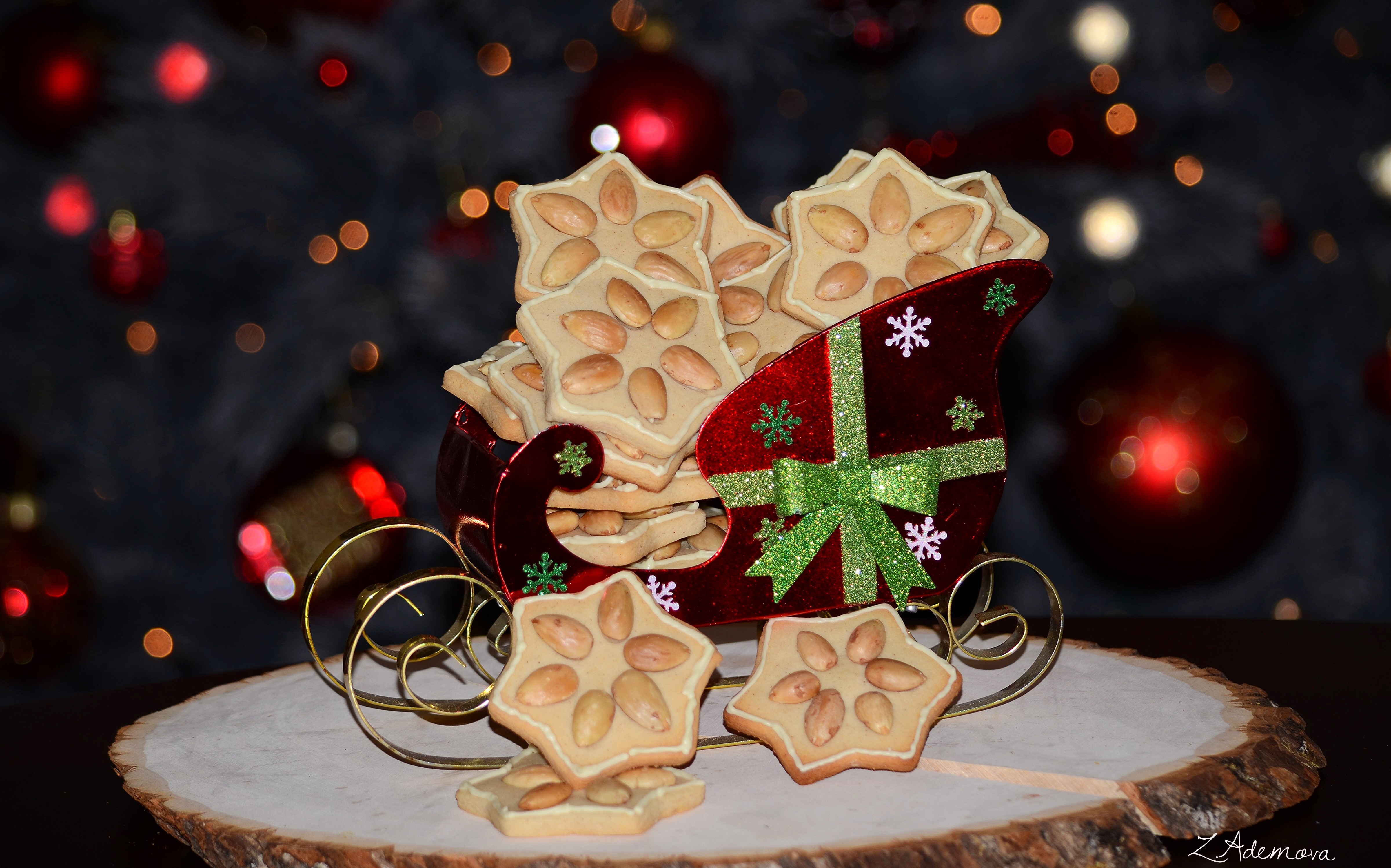 Christmas star cookies in a sleigh HD Wallpaper