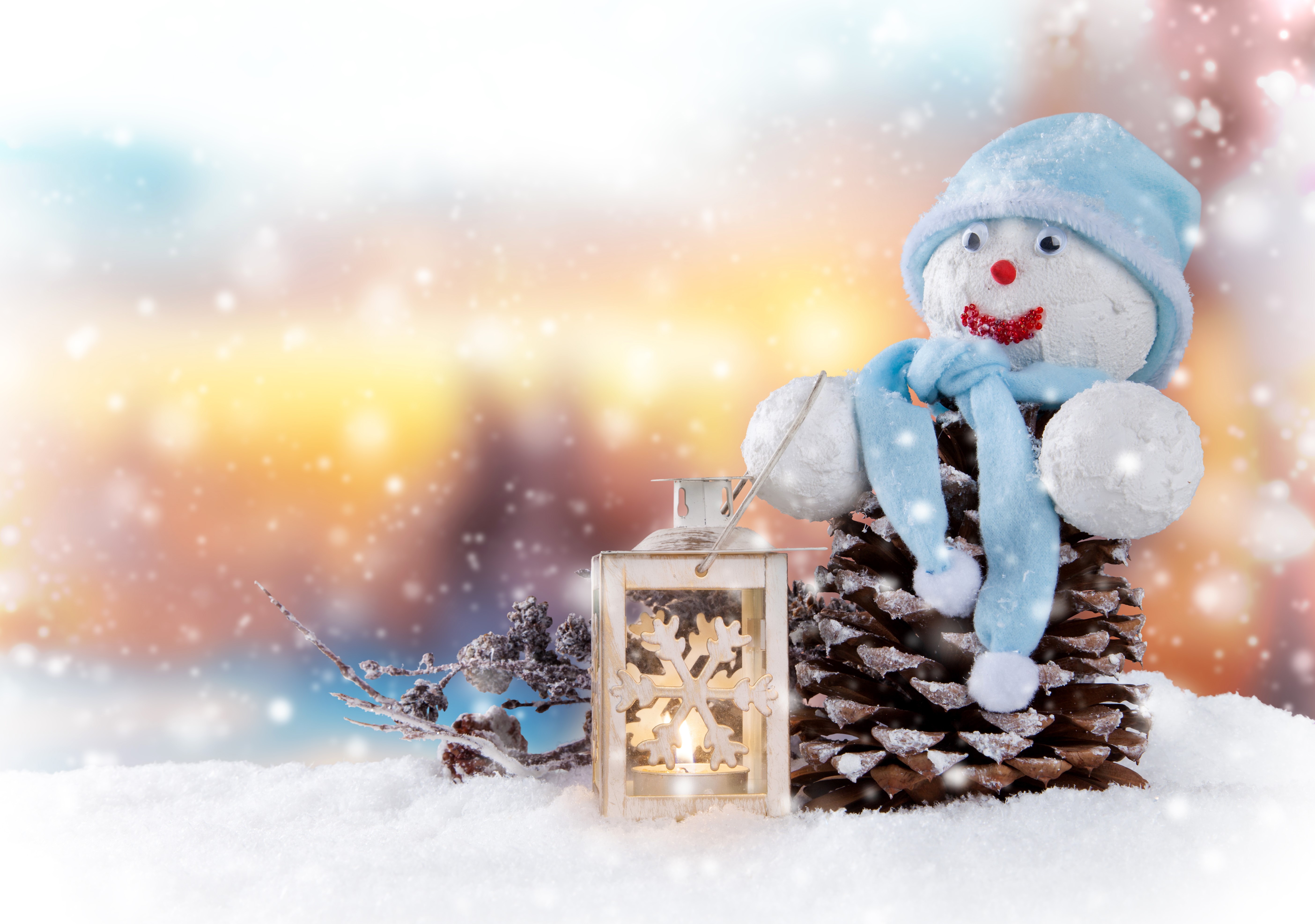 Snowman on pine cone with lantern and snow HD Wallpaper