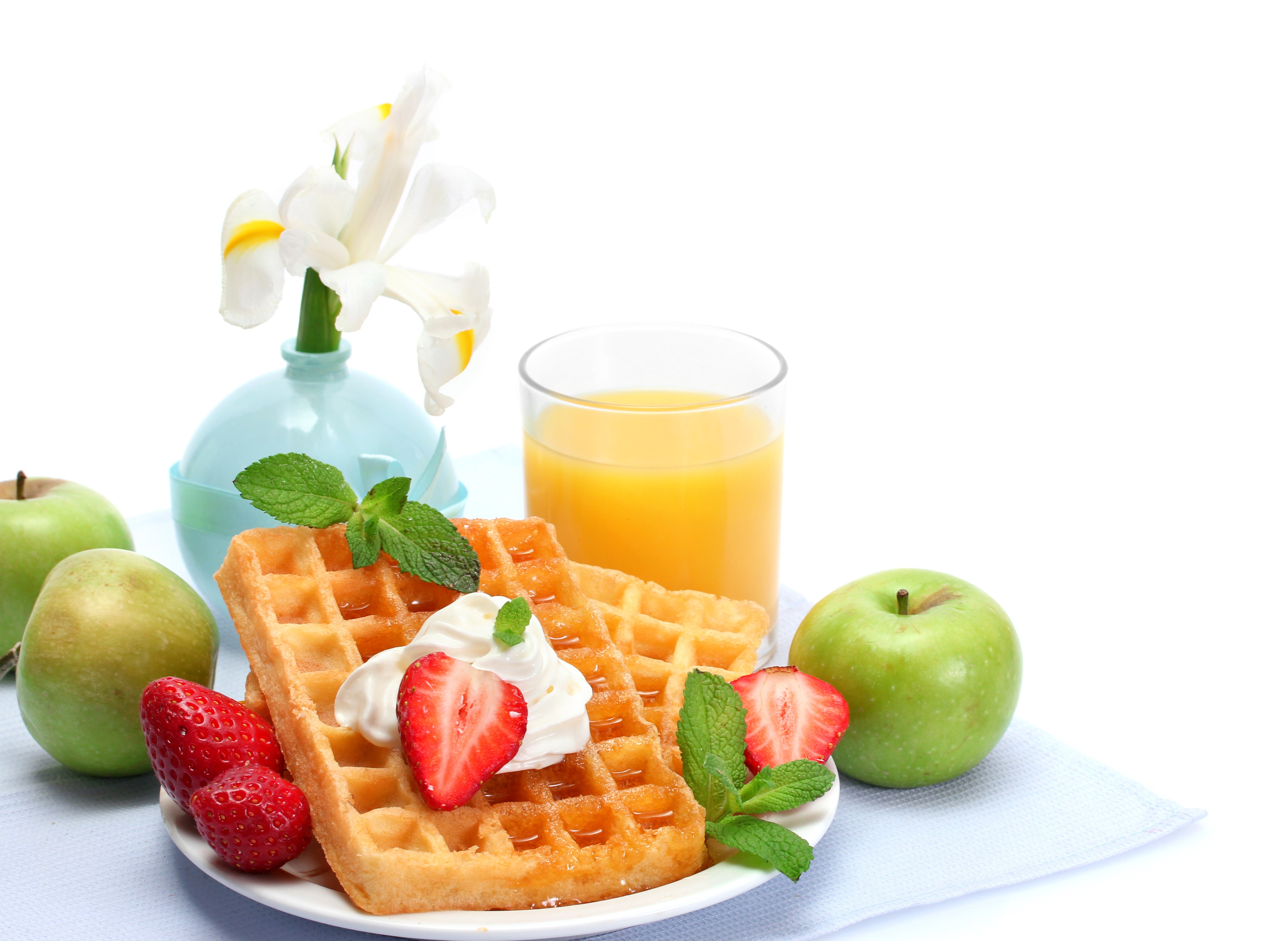 Still-life of waffles, strawberries, apples, juice, and irises HD Wallpaper
