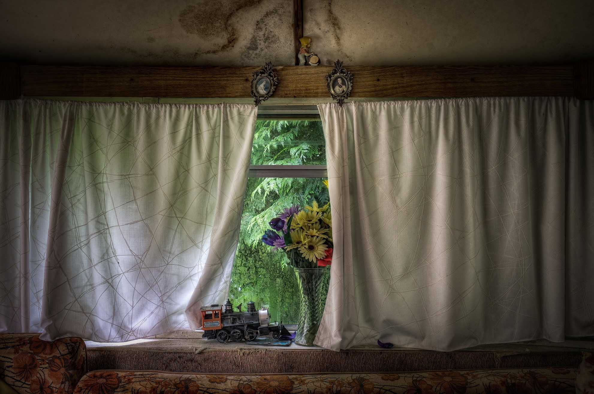 Toy train and flowers by the window HD Wallpaper