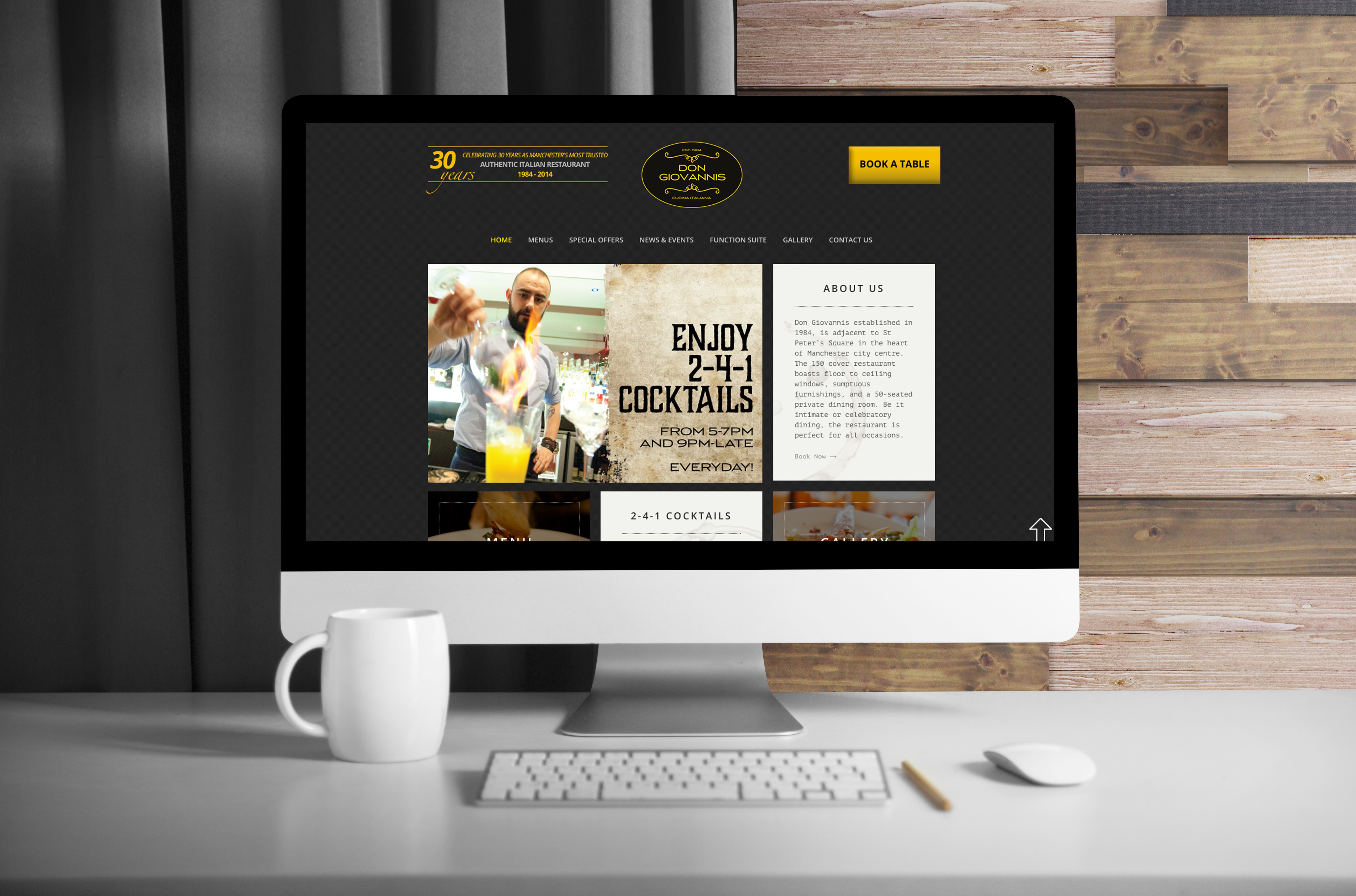 Don Giovannis restaurant website on an Apple iMac HD Wallpaper