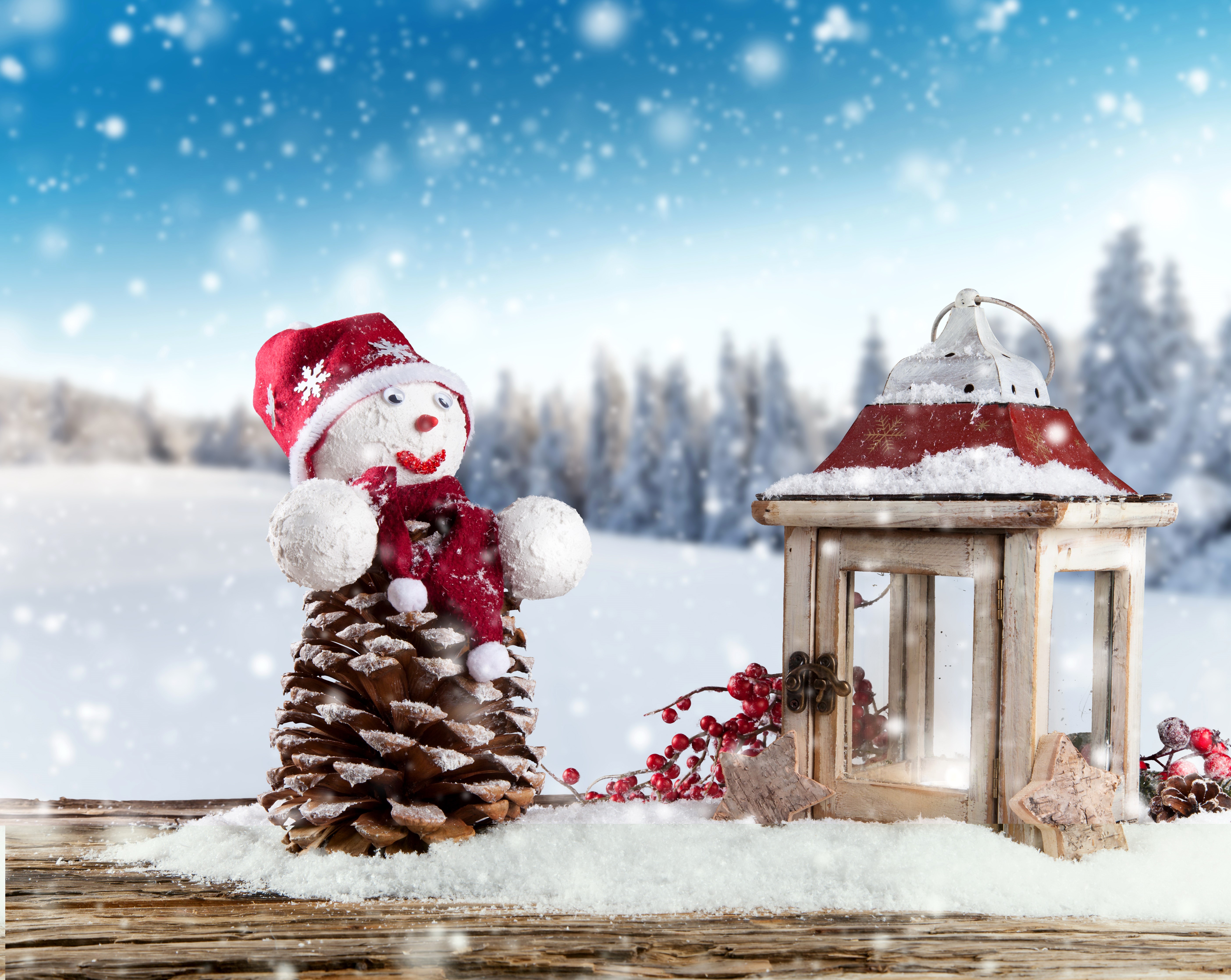 Christmas snowman and lantern in snowy forest HD Wallpaper