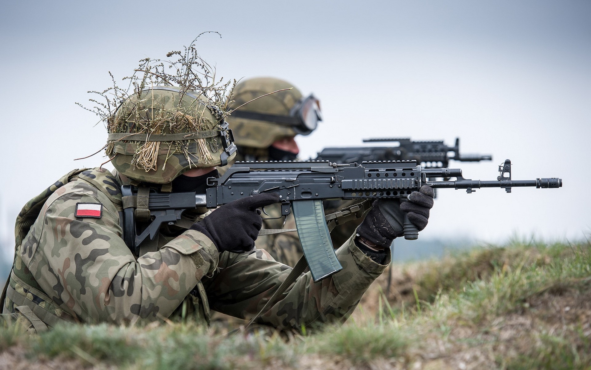 Soldiers with assault rifles in military helmets HD Wallpaper